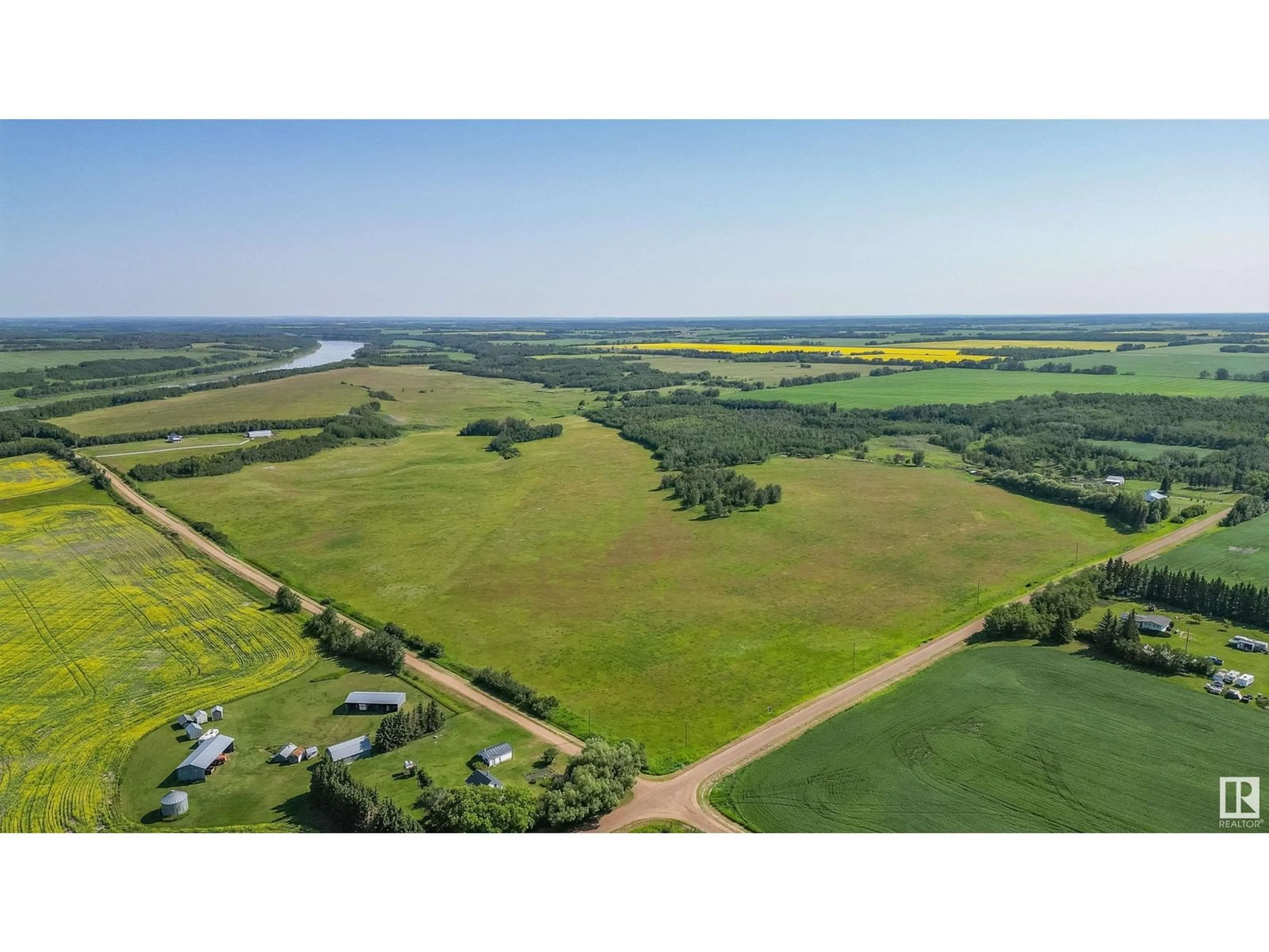 A pic from outside/outdoor area/front of a property/back of a property/a pic from drone, water/lake/river/ocean view for 201058 TWP RD 572, Rural Lamont County Alberta T0N0S0