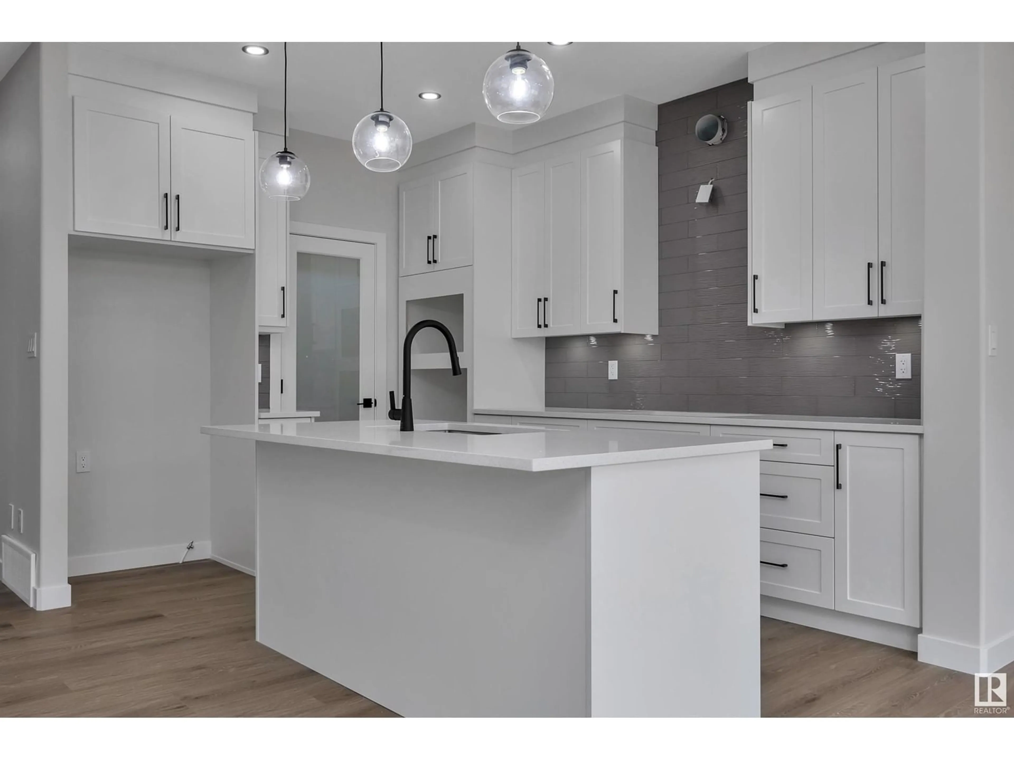 Open concept kitchen, unknown for 204 Kettyl Court, Leduc Alberta T9E1B6