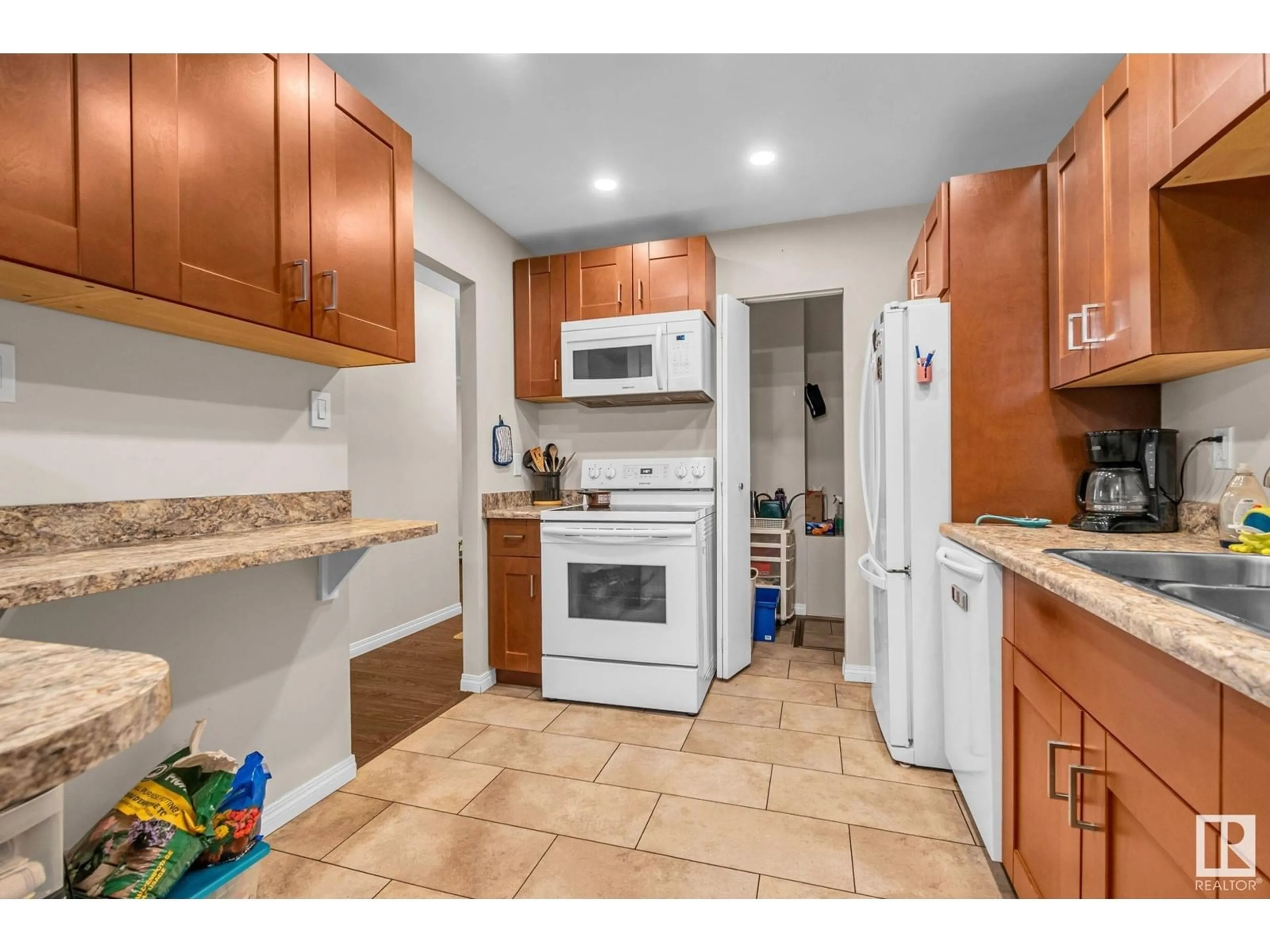 Standard kitchen, ceramic/tile floor for 2320 151 AV NW NW, Edmonton Alberta T5Y2L1