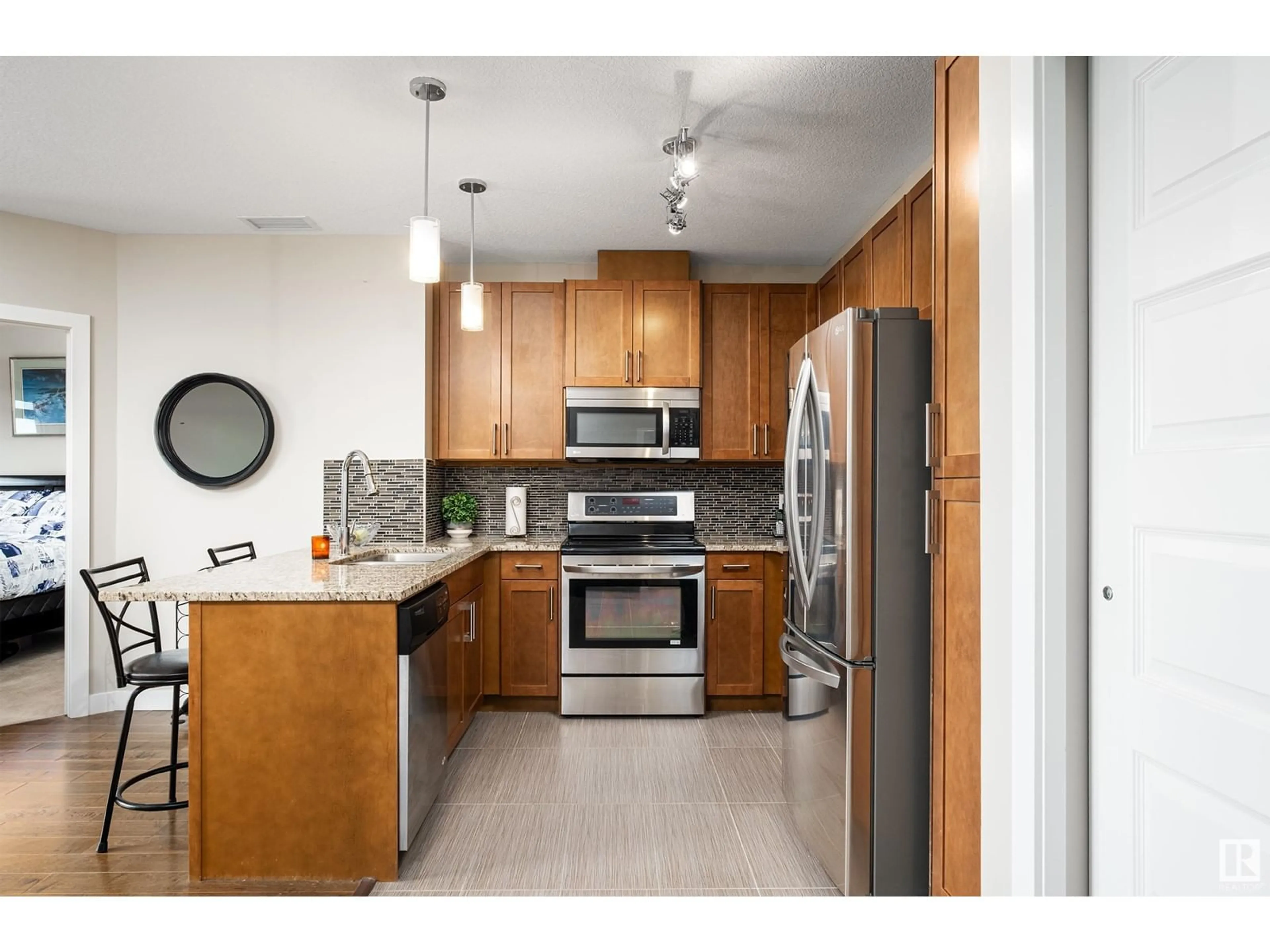 Standard kitchen, ceramic/tile floor for #505 5151 Windermere BV SW, Edmonton Alberta T6W2K4