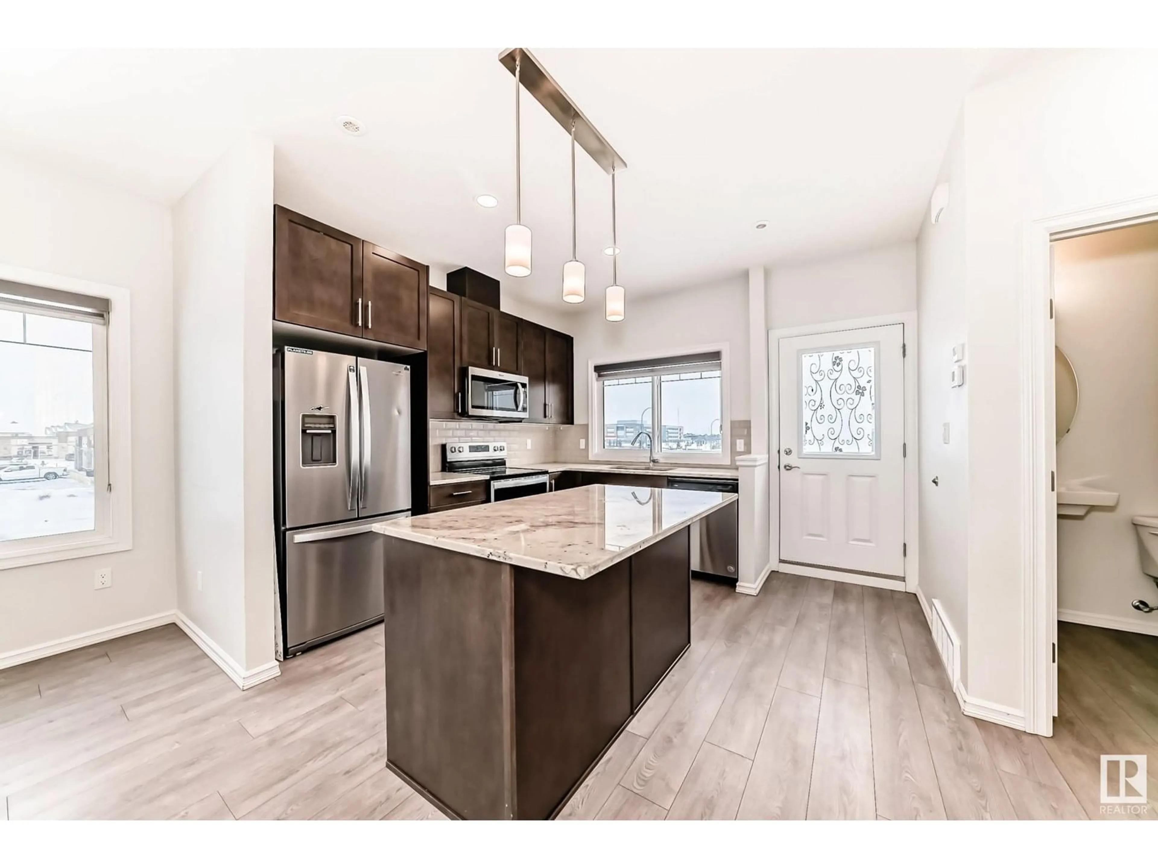 Open concept kitchen, unknown for #47 2215 24 ST NW, Edmonton Alberta T6T1A6