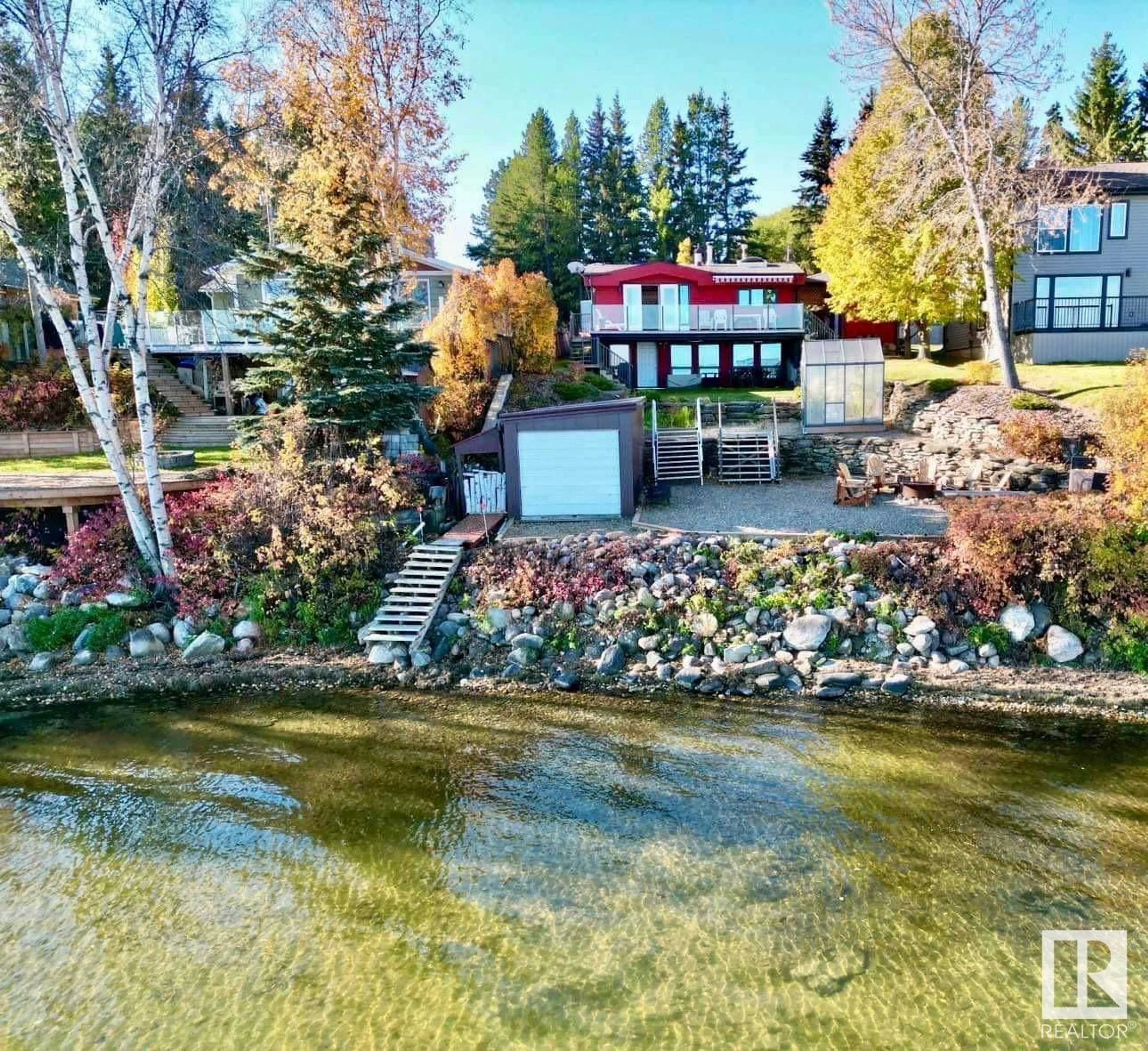 A pic from outside/outdoor area/front of a property/back of a property/a pic from drone, water/lake/river/ocean view for 510 5 ST, Rural Wetaskiwin County Alberta T0C2V0