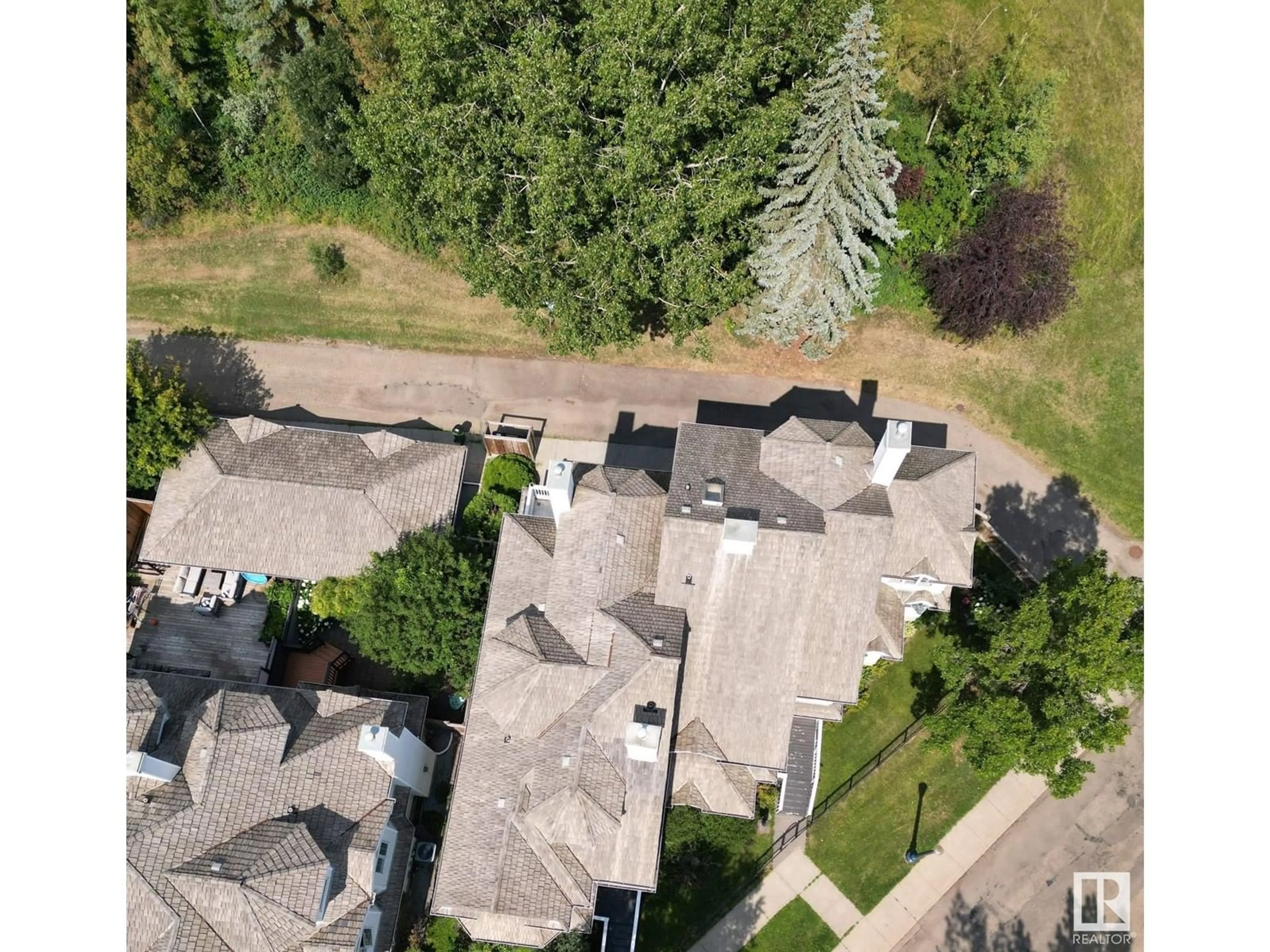 A pic from outside/outdoor area/front of a property/back of a property/a pic from drone, street for 10004 97 AV NW, Edmonton Alberta T5K0B1