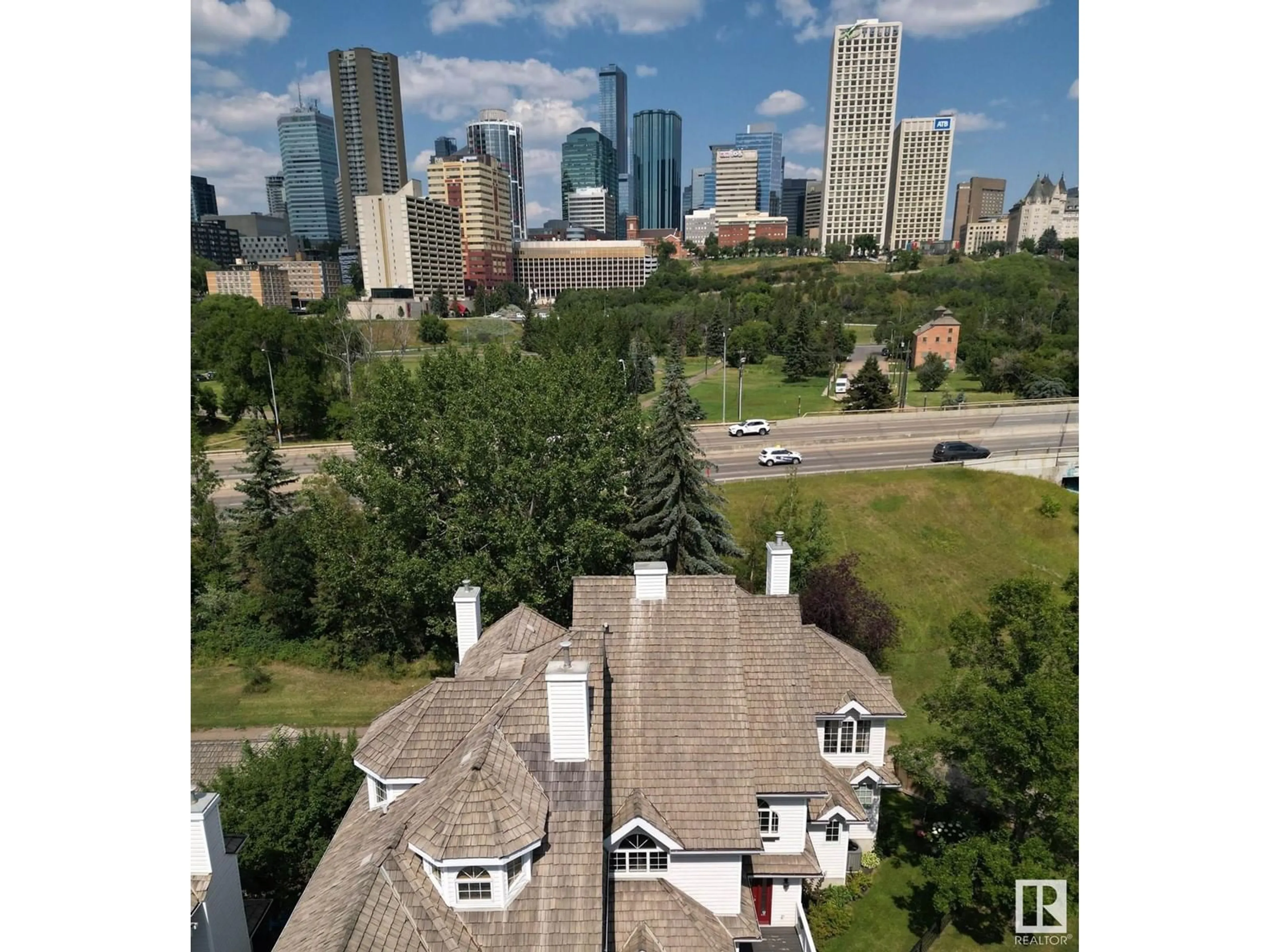 A pic from outside/outdoor area/front of a property/back of a property/a pic from drone, city buildings view from balcony for 10004 97 AV NW, Edmonton Alberta T5K0B1