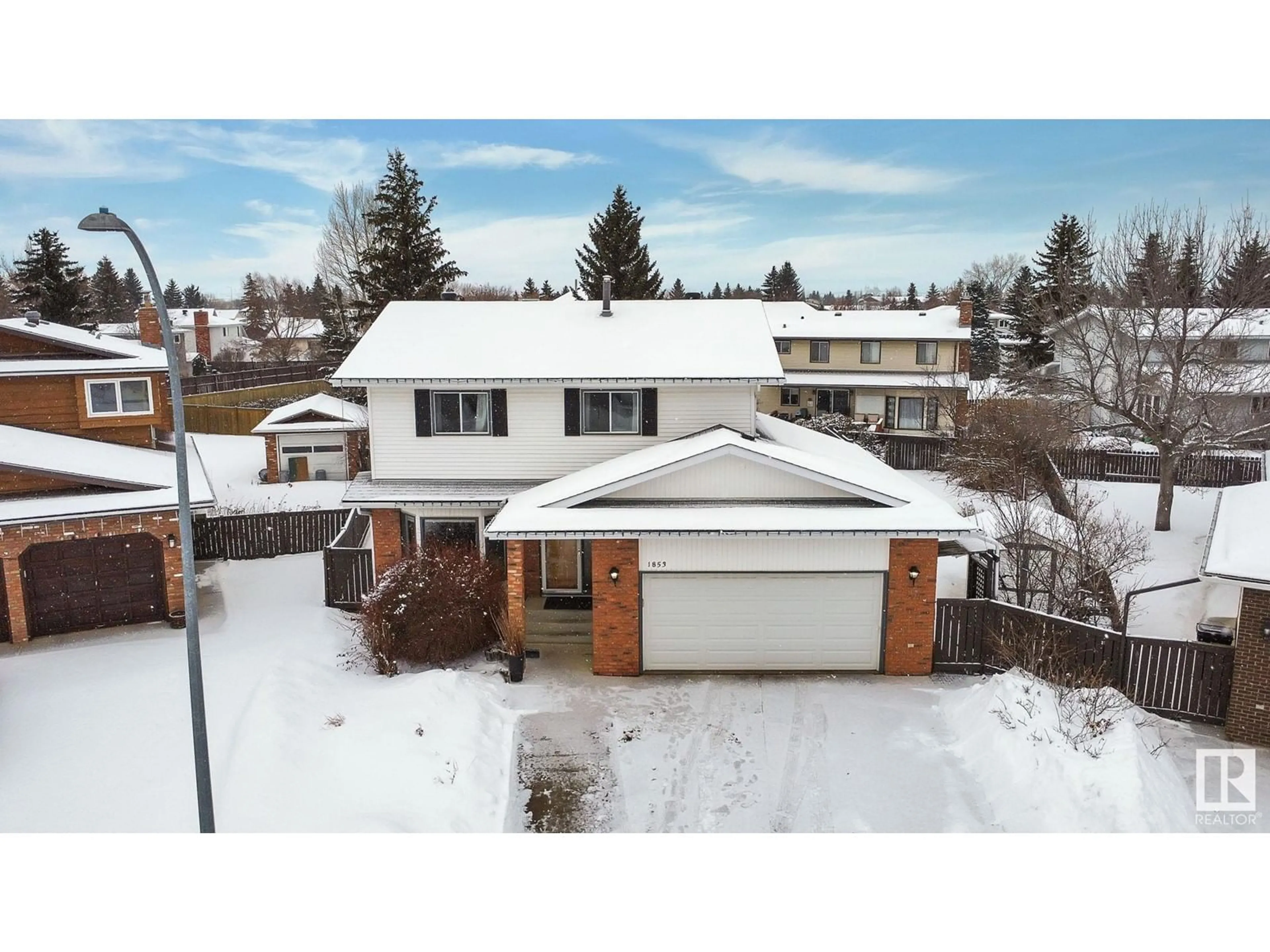 A pic from outside/outdoor area/front of a property/back of a property/a pic from drone, street for 1853 104A ST NW, Edmonton Alberta T6J5C1