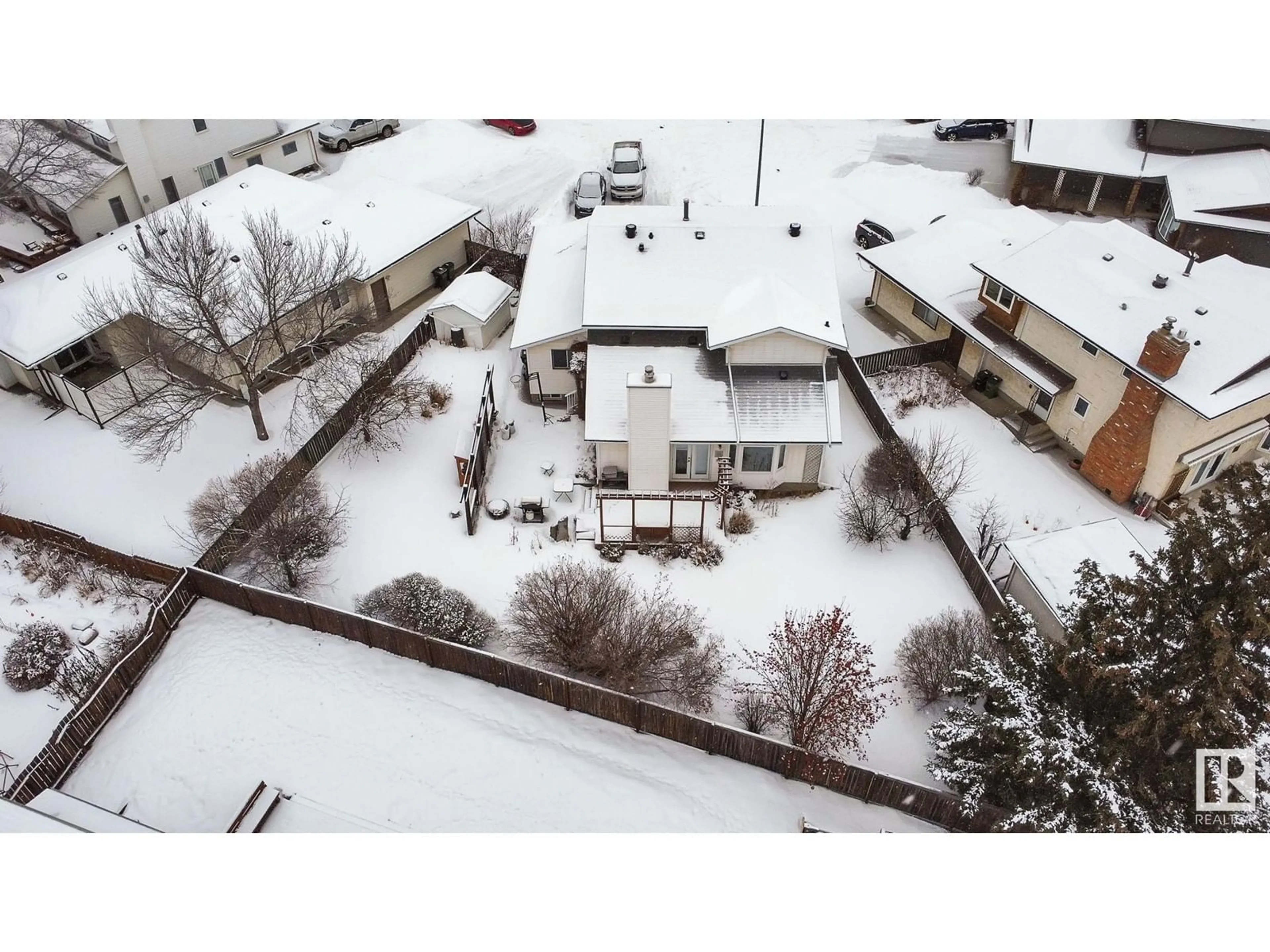 A pic from outside/outdoor area/front of a property/back of a property/a pic from drone, street for 1853 104A ST NW, Edmonton Alberta T6J5C1