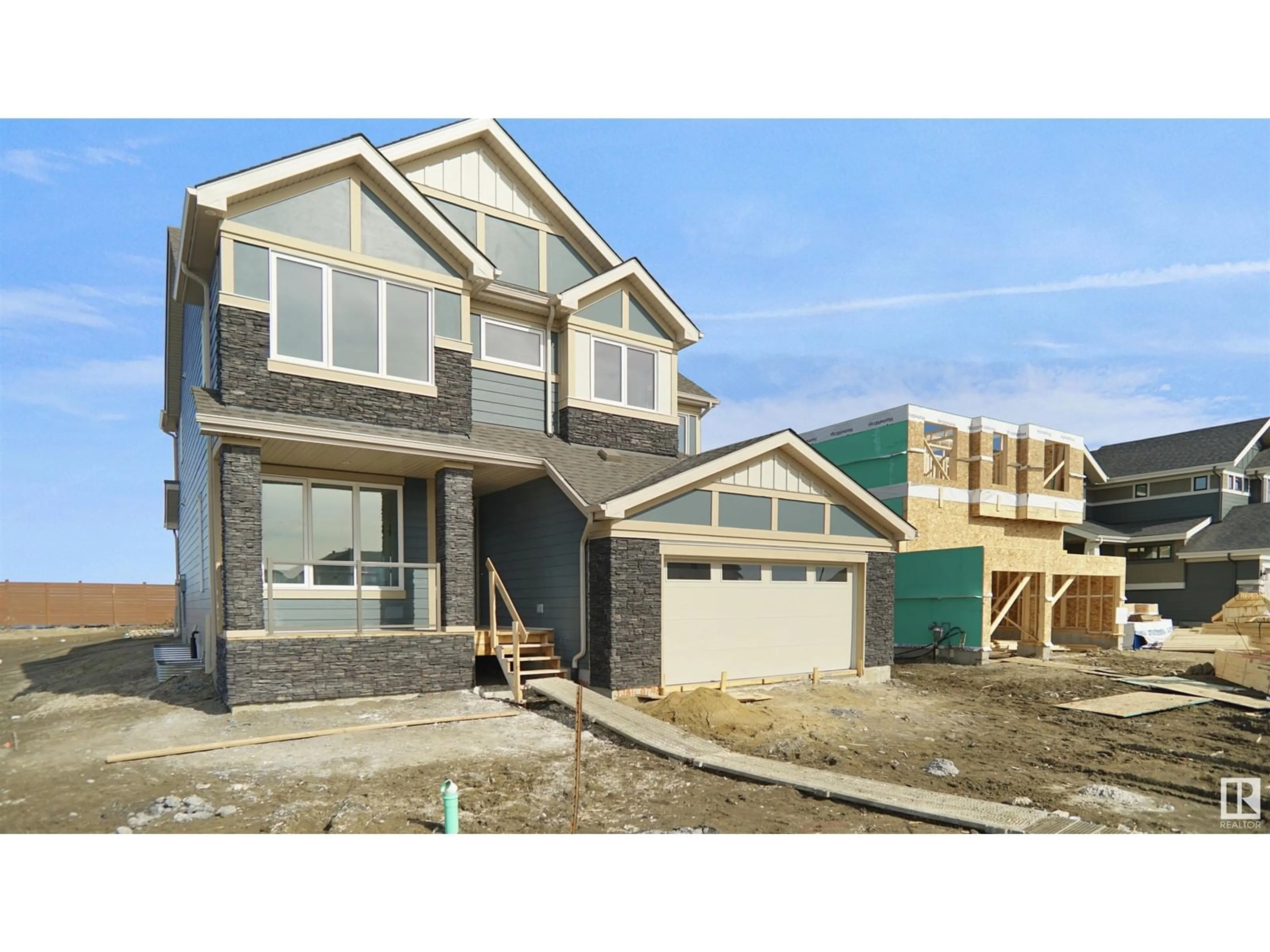 Home with vinyl exterior material, street for 57 JUBILATION DR, St. Albert Alberta T8N7V4