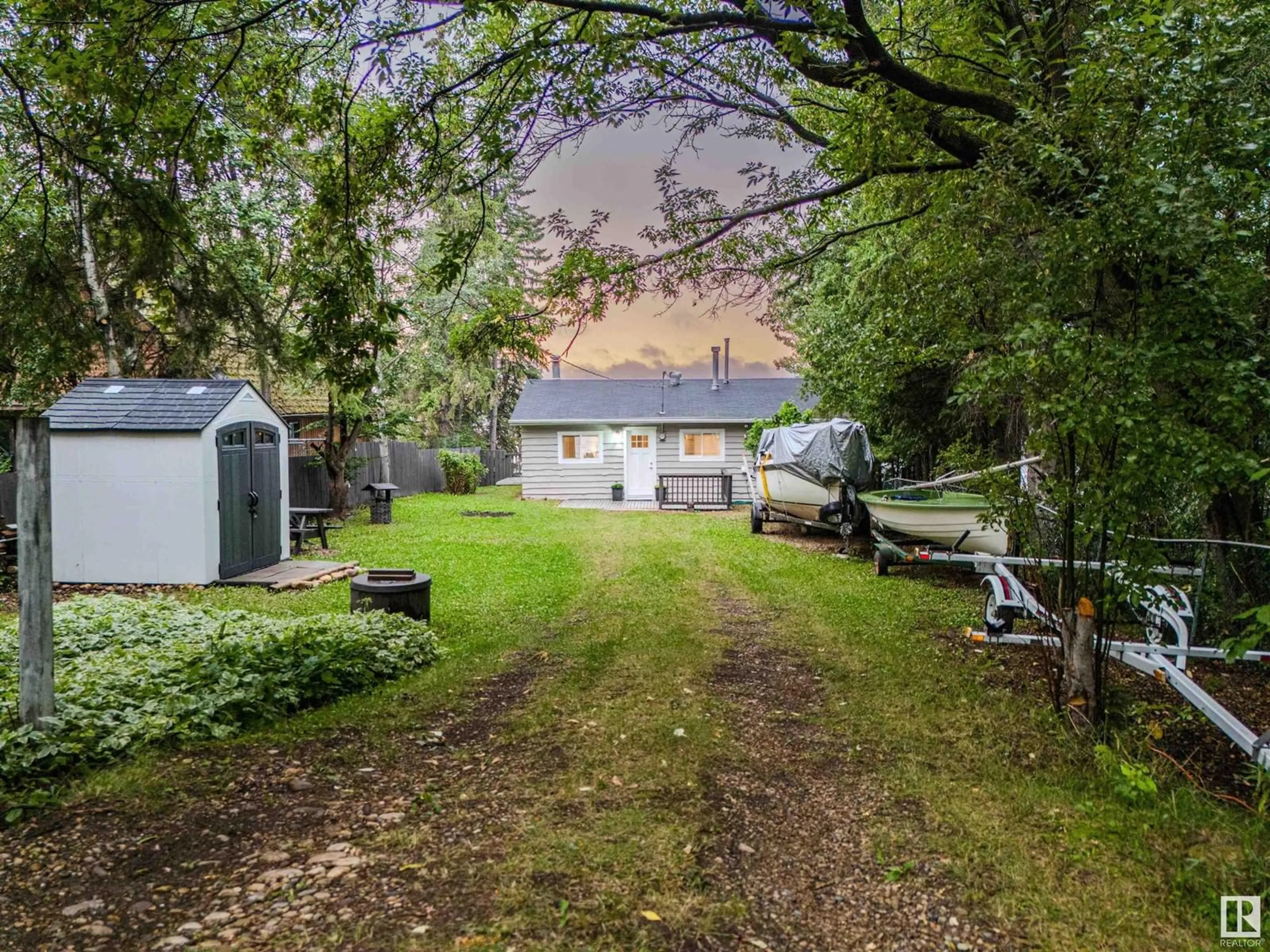 A pic from outside/outdoor area/front of a property/back of a property/a pic from drone, unknown for 13 FIR AV, Rural Lac Ste. Anne County Alberta T0E0L0