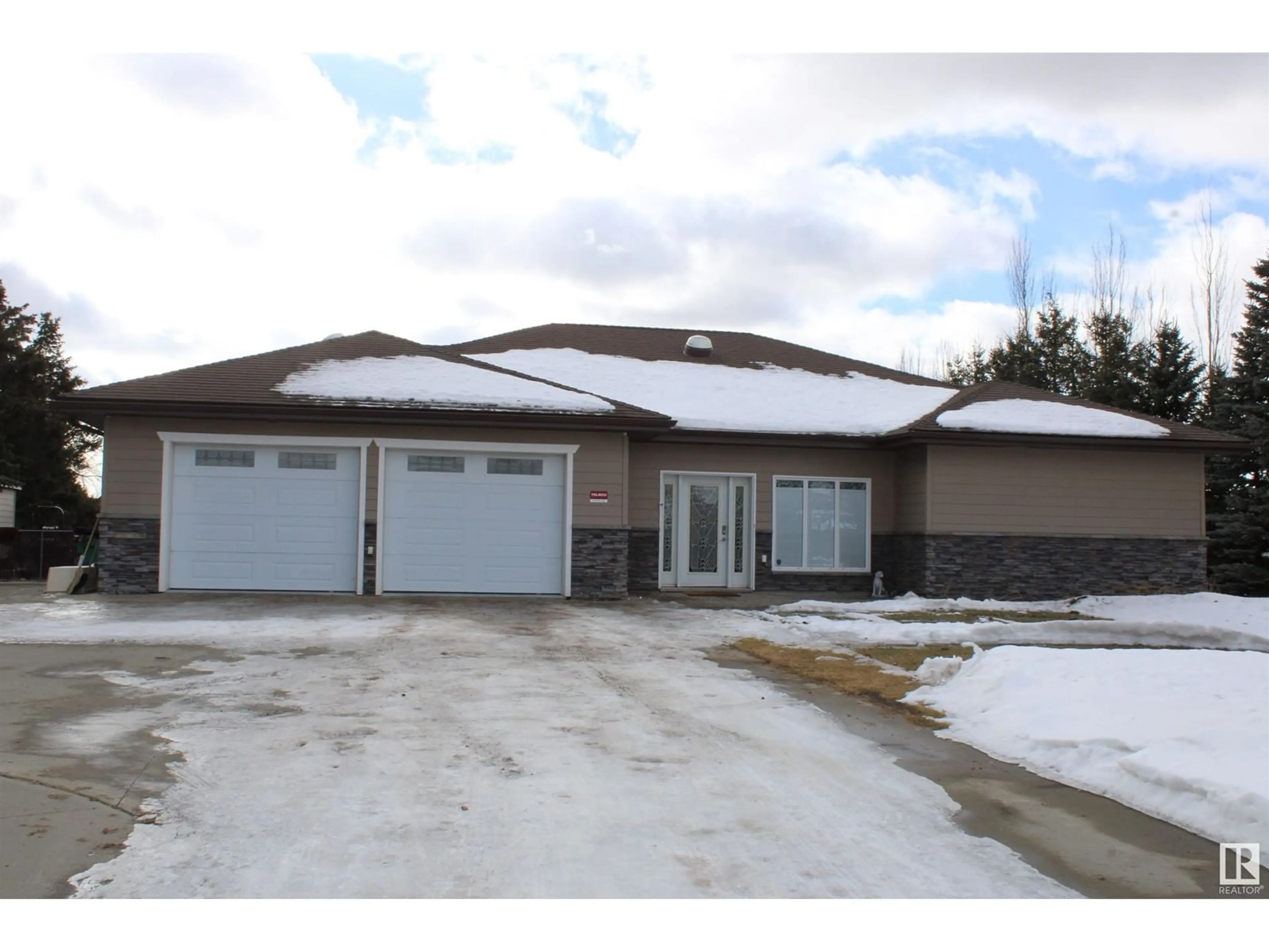 Home with vinyl exterior material, street for 115 50512 RGE ROAD 245, Rural Leduc County Alberta T4X0P5