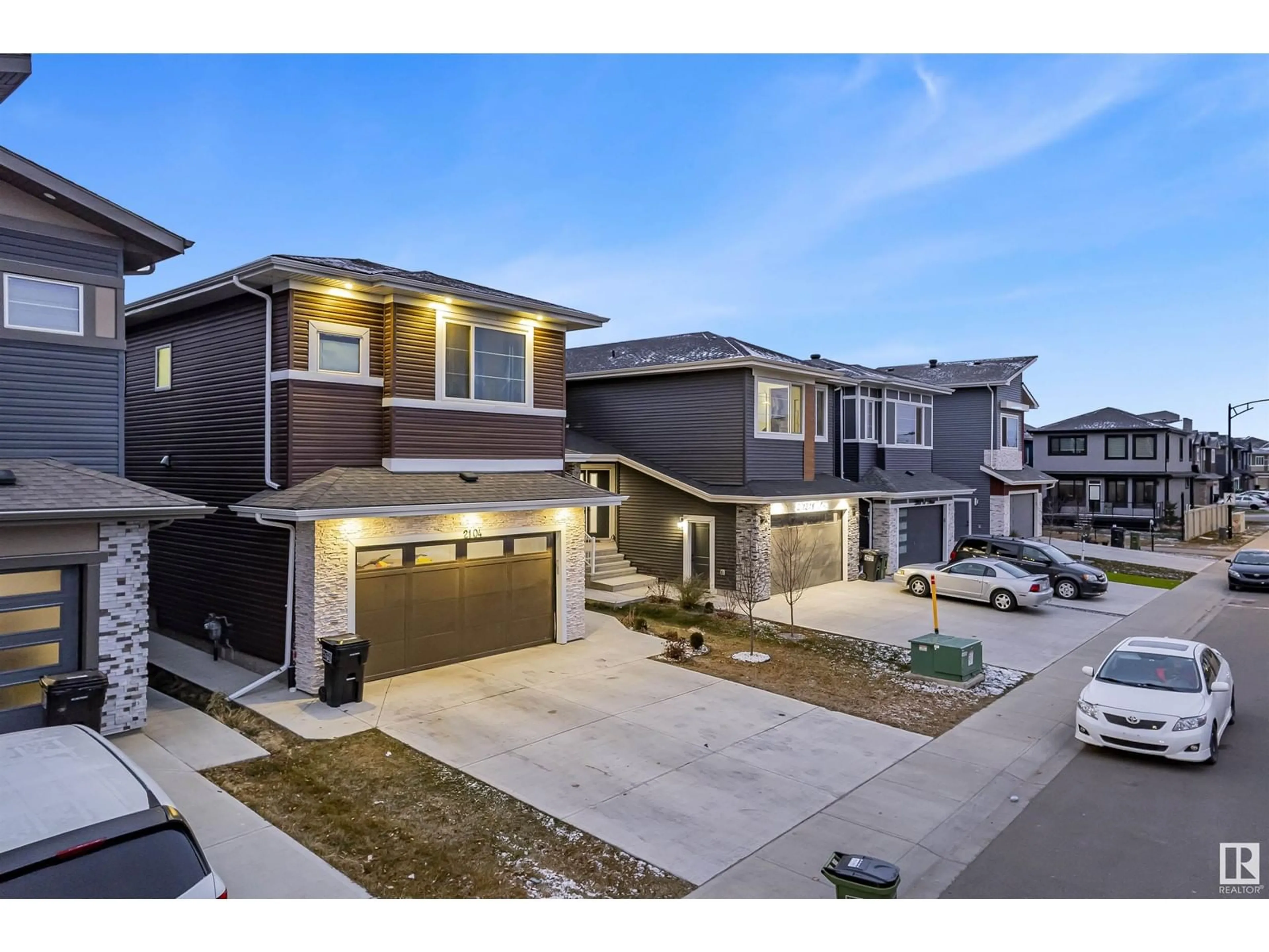 A pic from outside/outdoor area/front of a property/back of a property/a pic from drone, street for 2104 18 AV NW, Edmonton Alberta T6T2M8