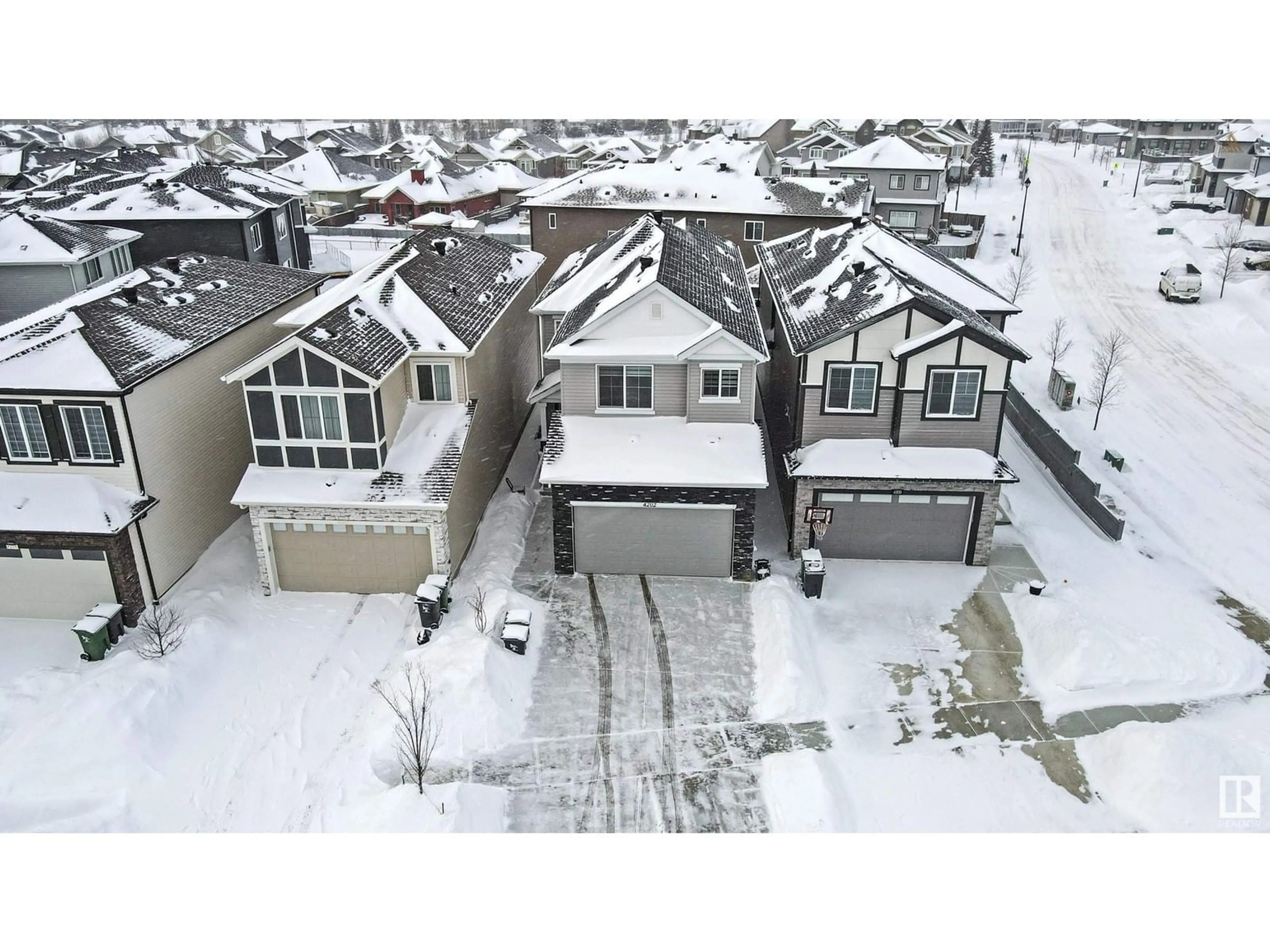 A pic from outside/outdoor area/front of a property/back of a property/a pic from drone, street for 4202 38A ST, Beaumont Alberta T4X0C4