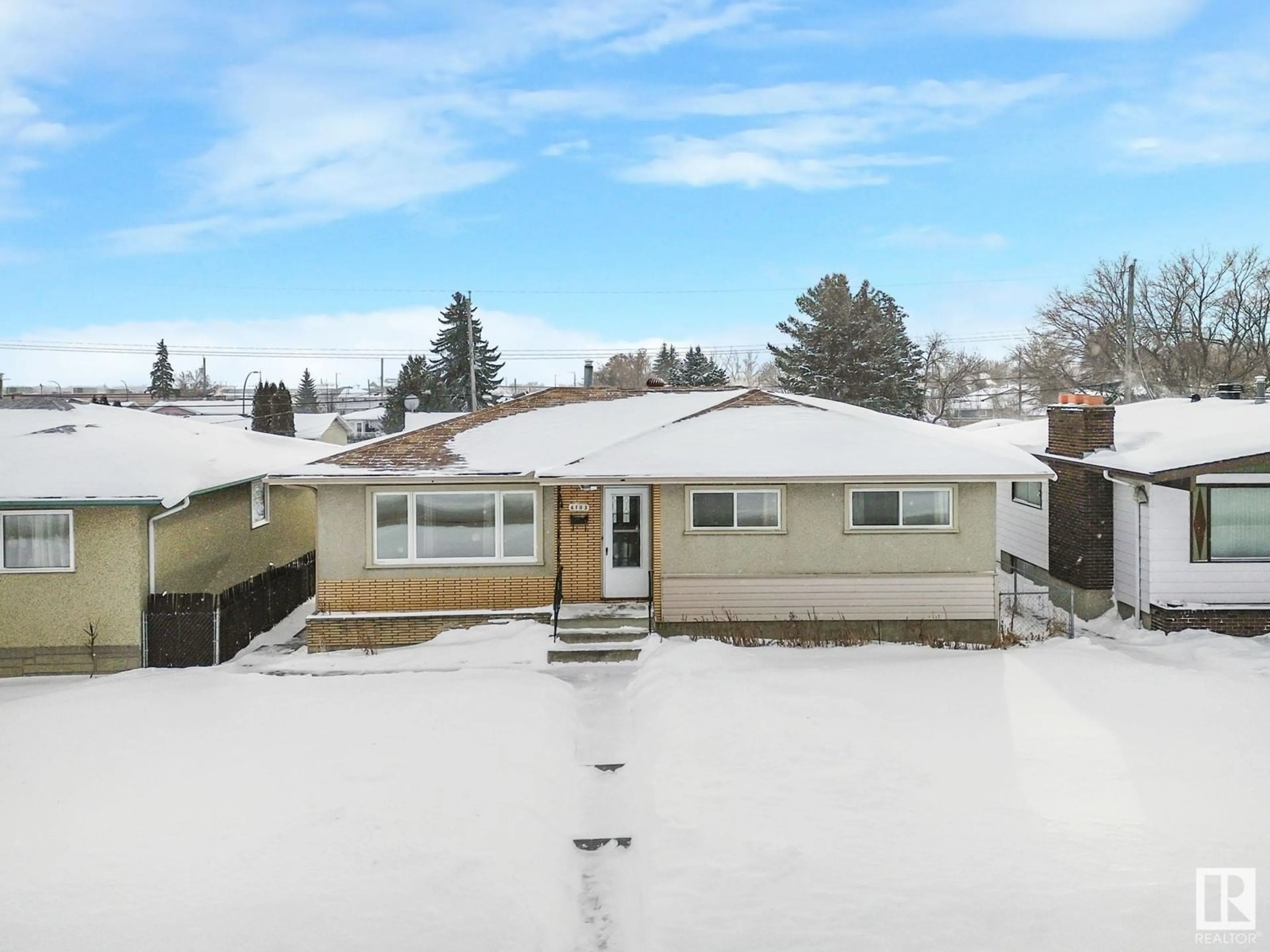 A pic from outside/outdoor area/front of a property/back of a property/a pic from drone, street for 6103 132 AV NW, Edmonton Alberta T5A0J8