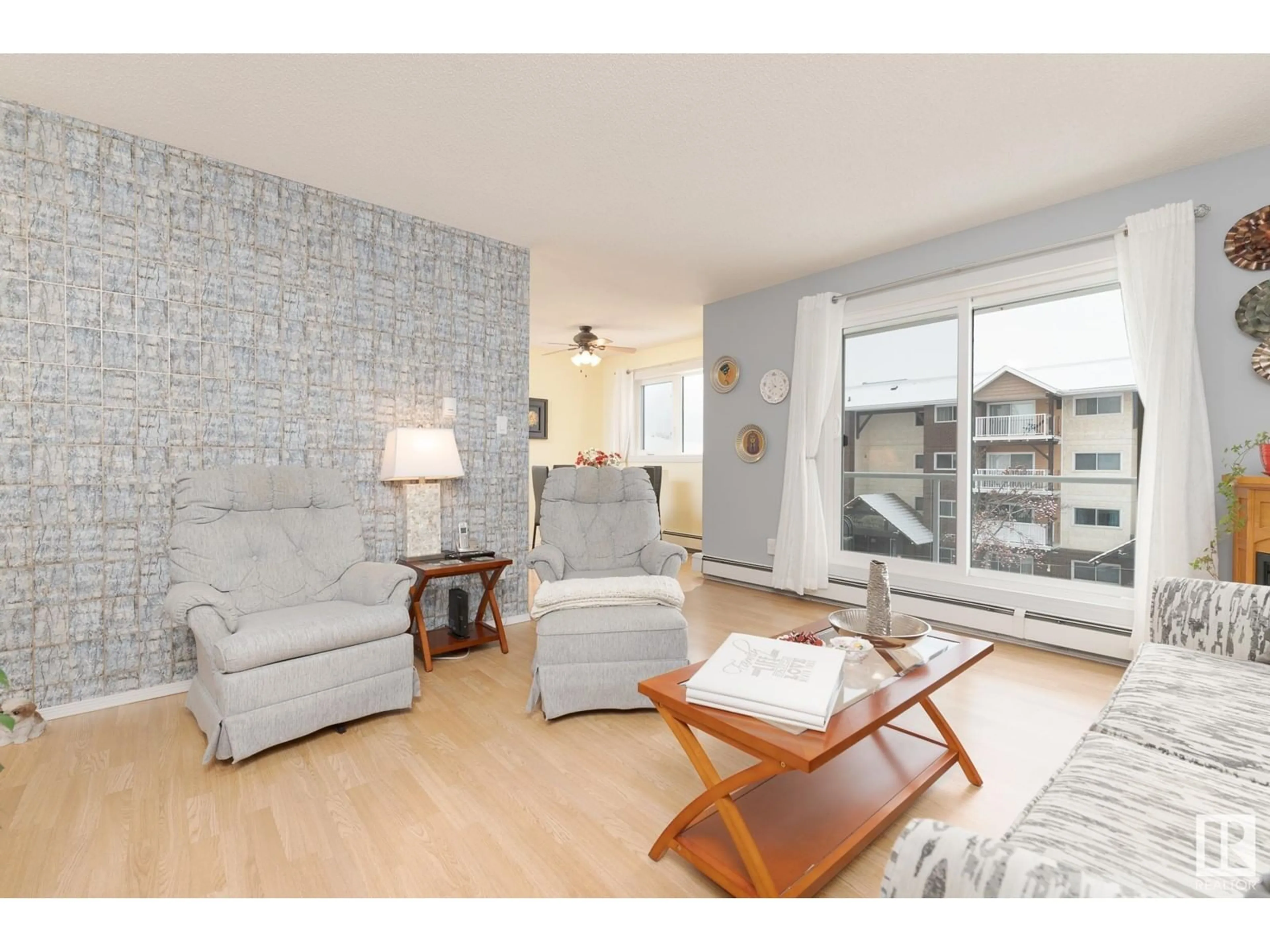 Living room with furniture, wood/laminate floor for #303 224 CHURCH RD, Spruce Grove Alberta T7X3E9