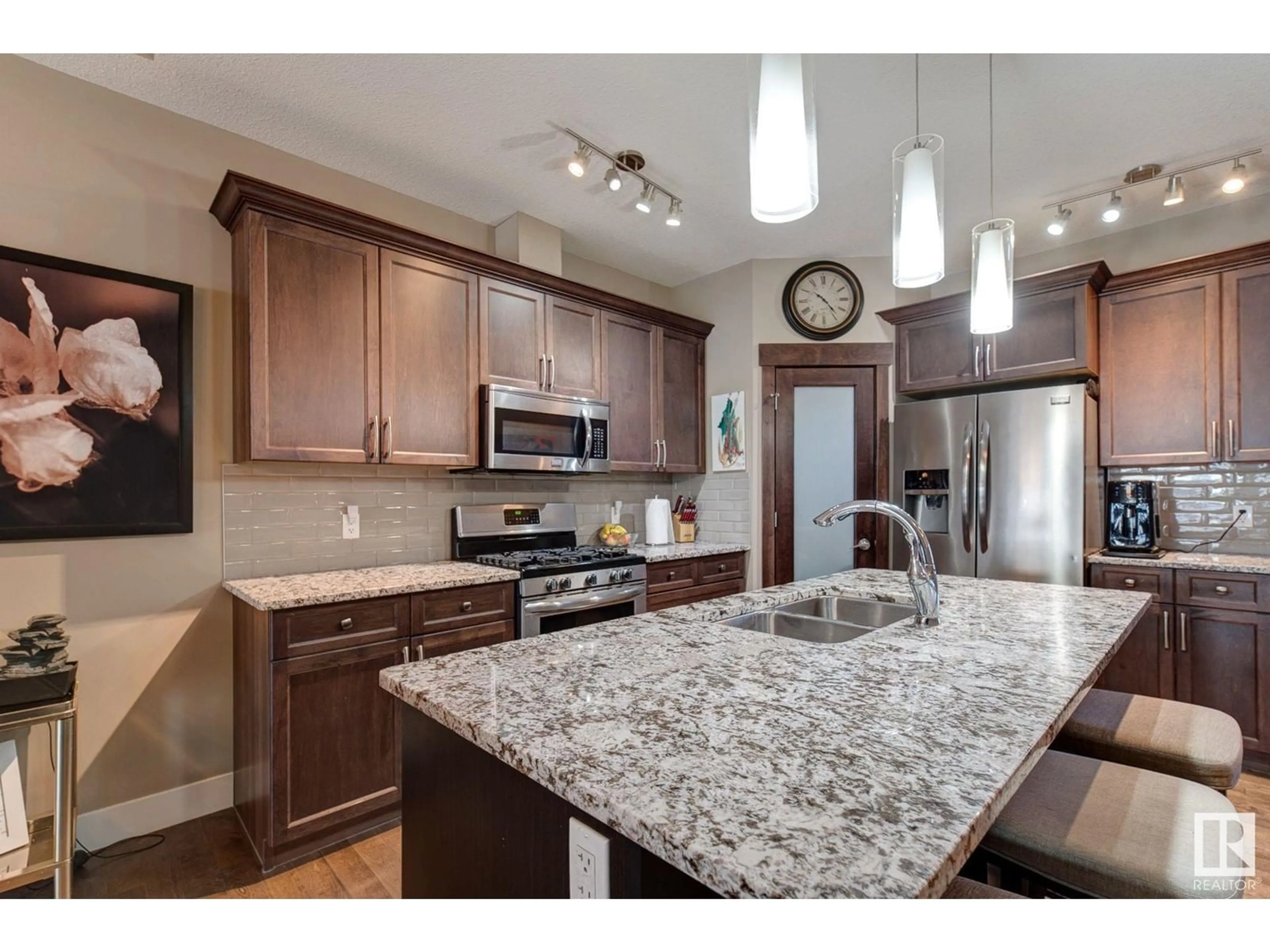 Open concept kitchen, ceramic/tile floor for #213 50 HEATHERGLEN DR, Spruce Grove Alberta T7X0R6