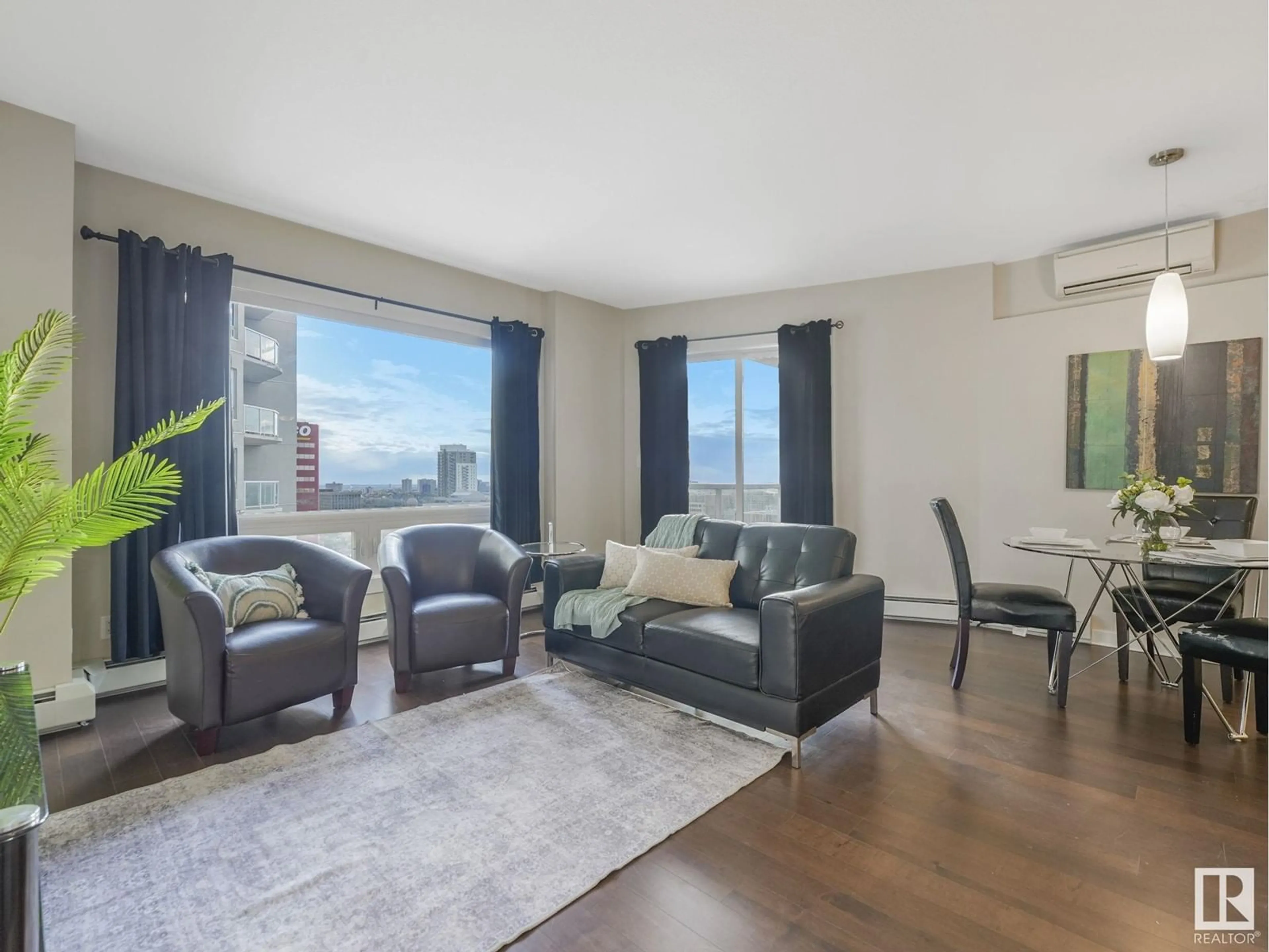 Living room with furniture, wood/laminate floor for #1905 10152 104 ST NW, Edmonton Alberta T5J0B6