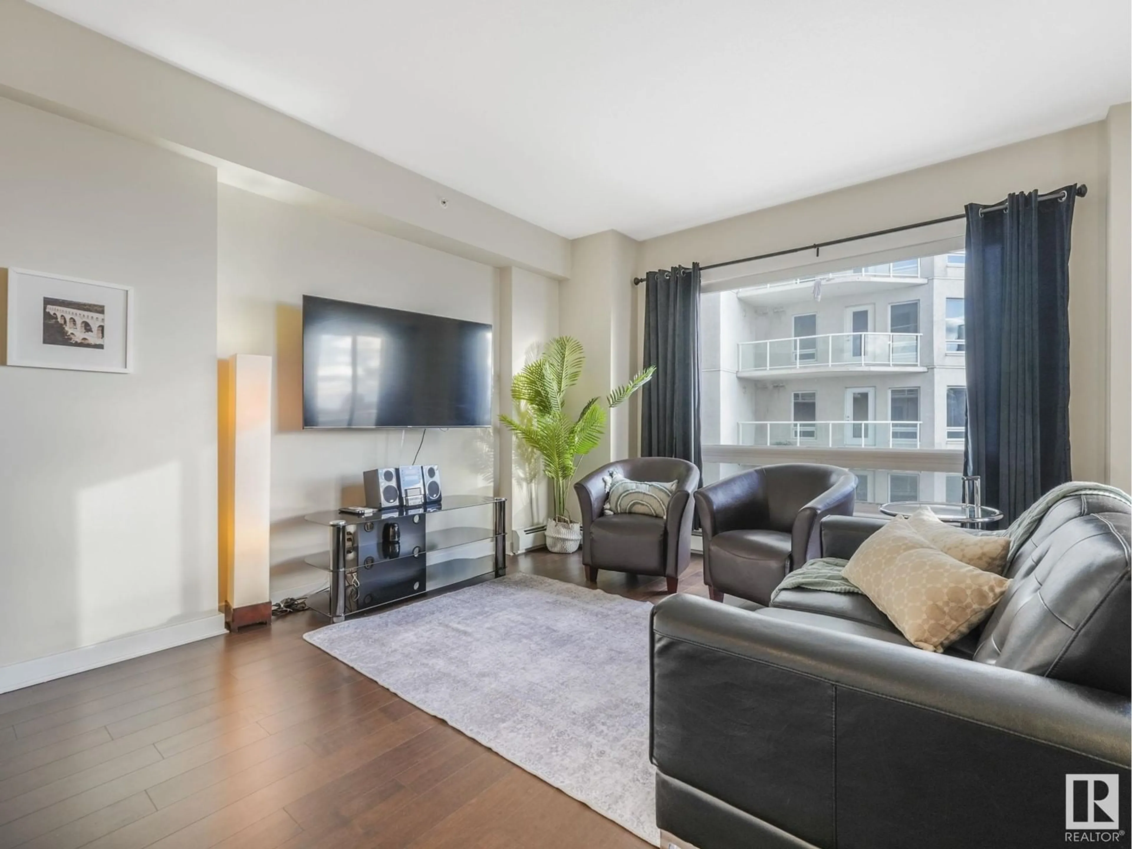 Living room with furniture, unknown for #1905 10152 104 ST NW, Edmonton Alberta T5J0B6