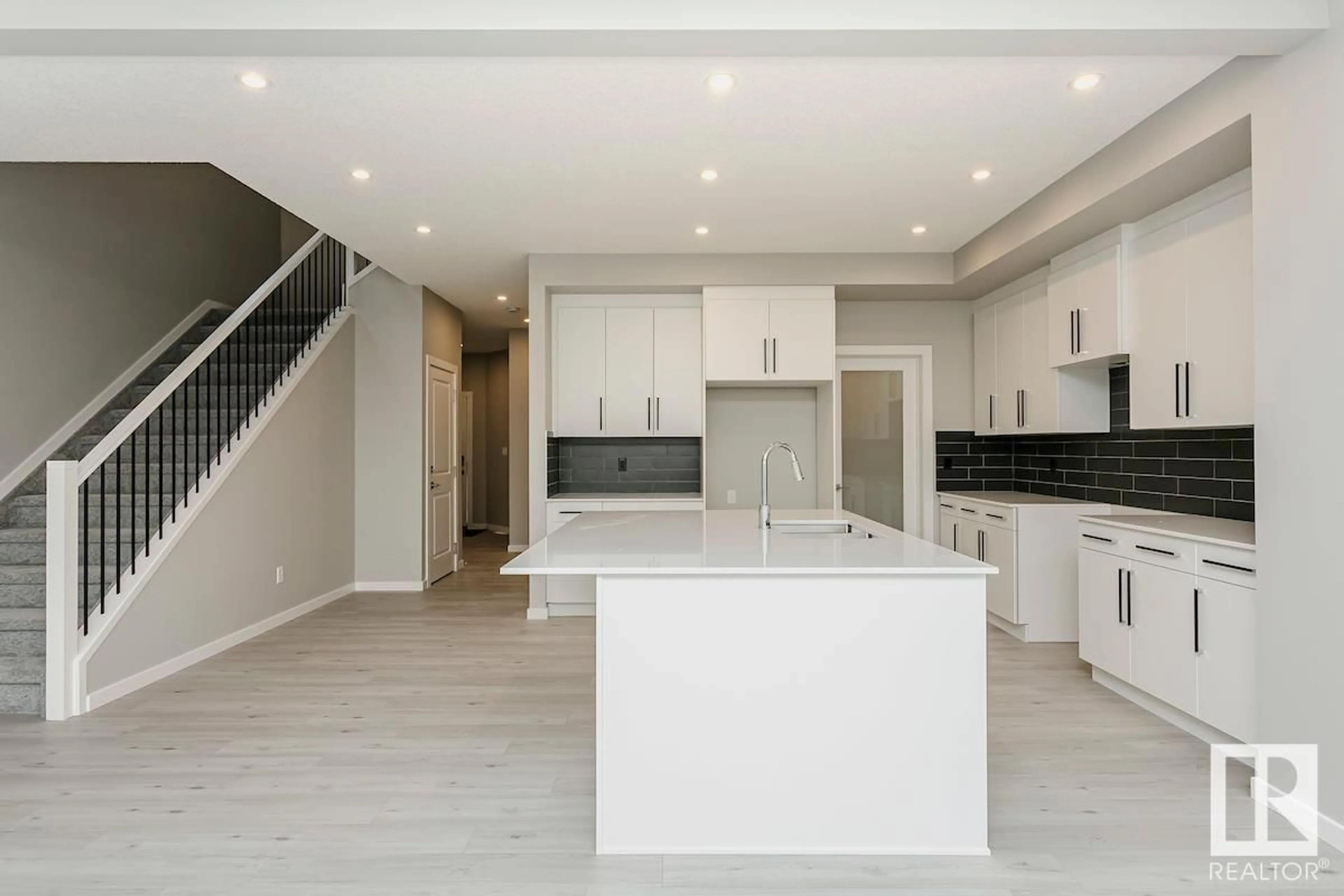 Open concept kitchen, ceramic/tile floor for 17239 2 ST NW, Edmonton Alberta T5Y4G5