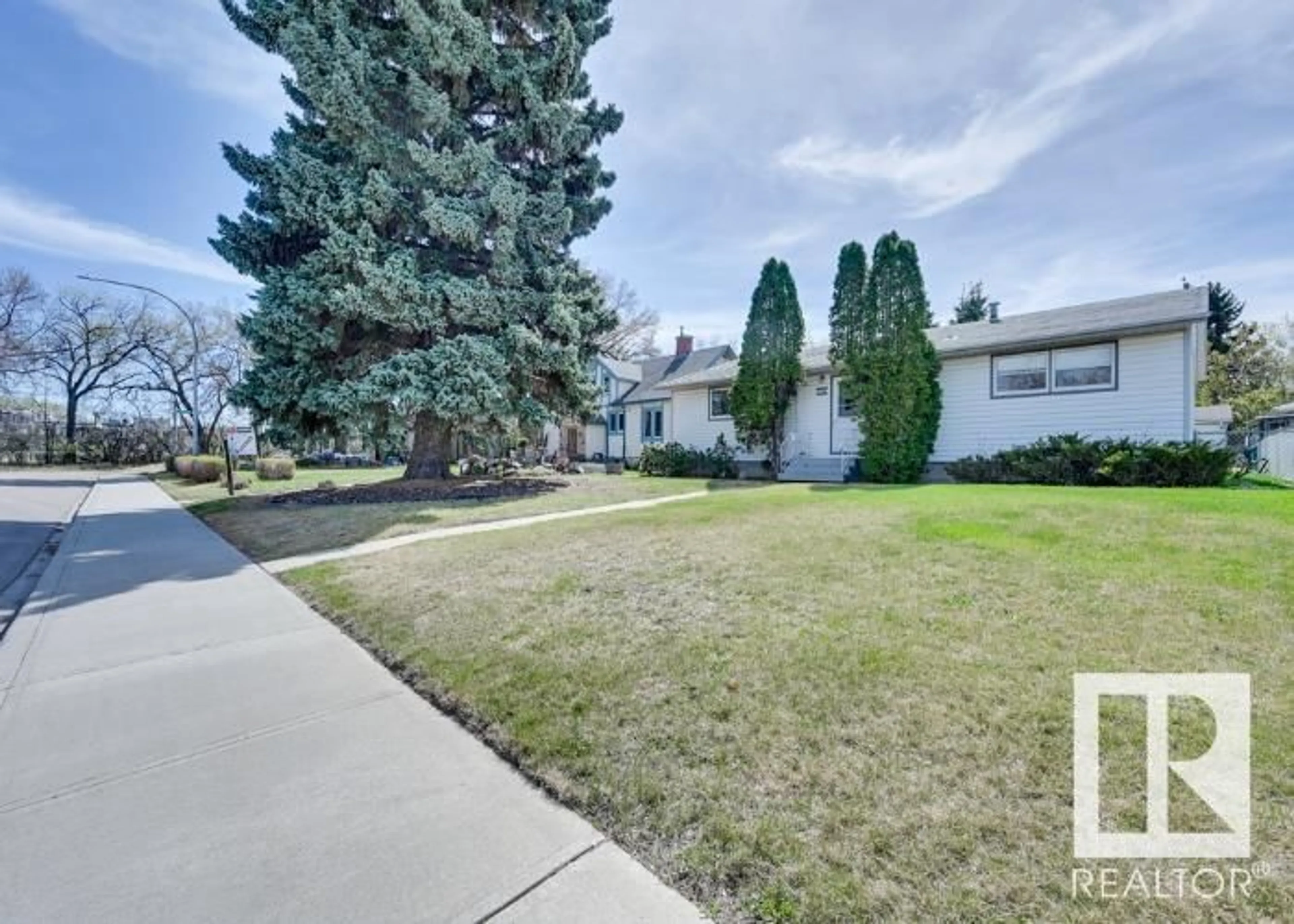 A pic from outside/outdoor area/front of a property/back of a property/a pic from drone, street for 5211 101A AV NW, Edmonton Alberta T6A0L7