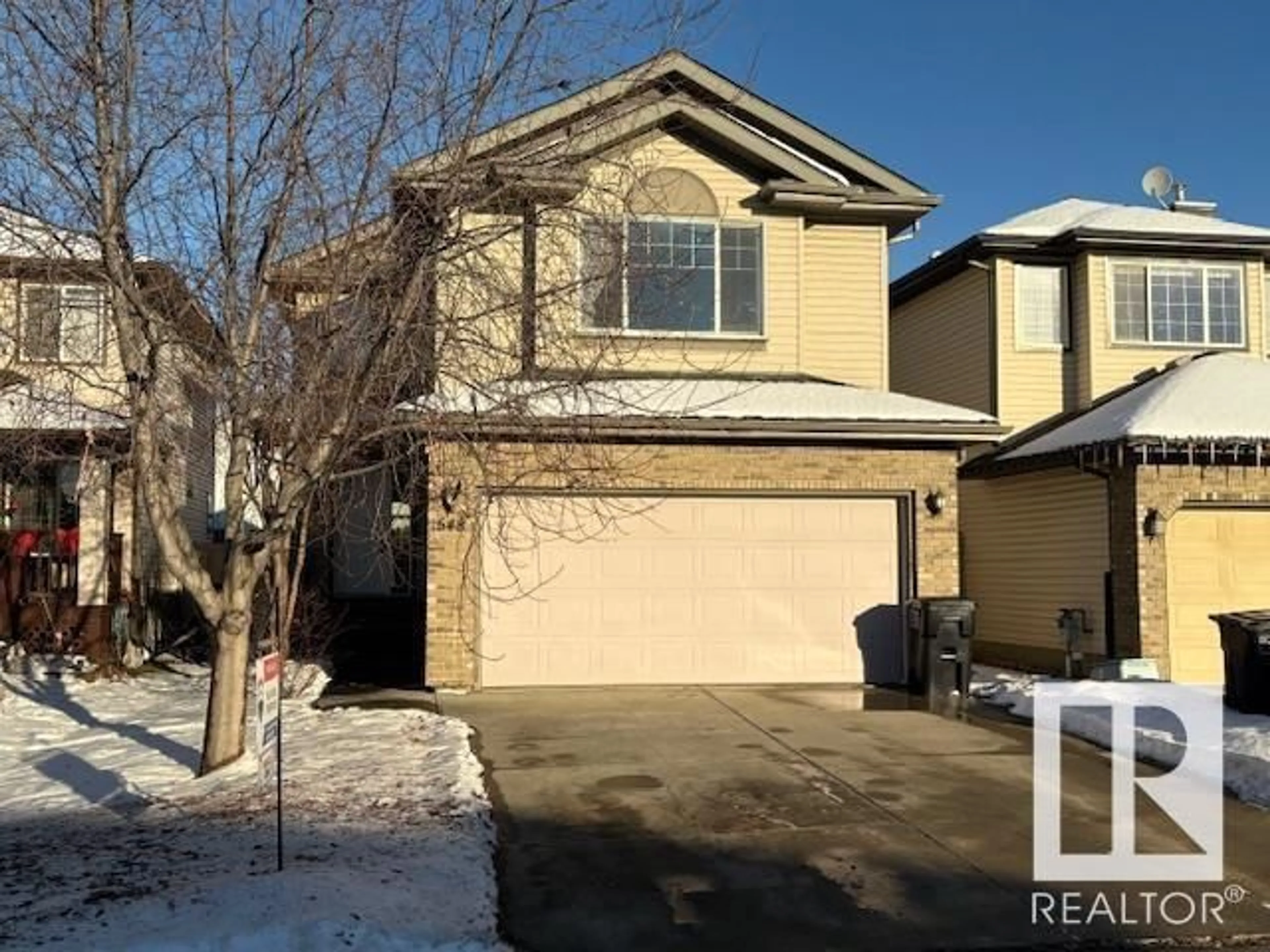 A pic from outside/outdoor area/front of a property/back of a property/a pic from drone, street for 548 LEGER WY NW, Edmonton Alberta T6R3T5