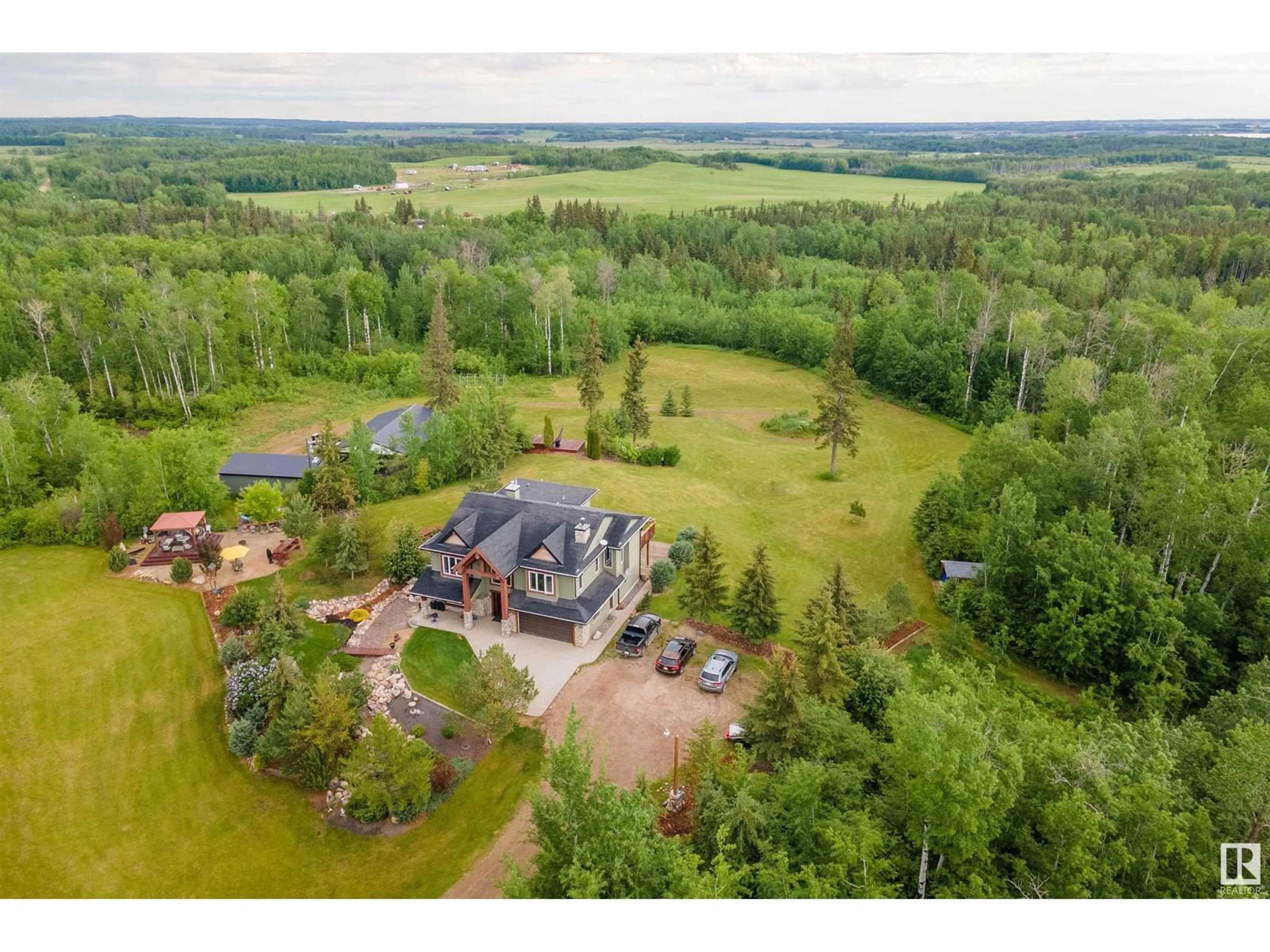 A pic from outside/outdoor area/front of a property/back of a property/a pic from drone, unknown for 56225 RGE RD 13, Rural Lac Ste. Anne County Alberta T0E1V0