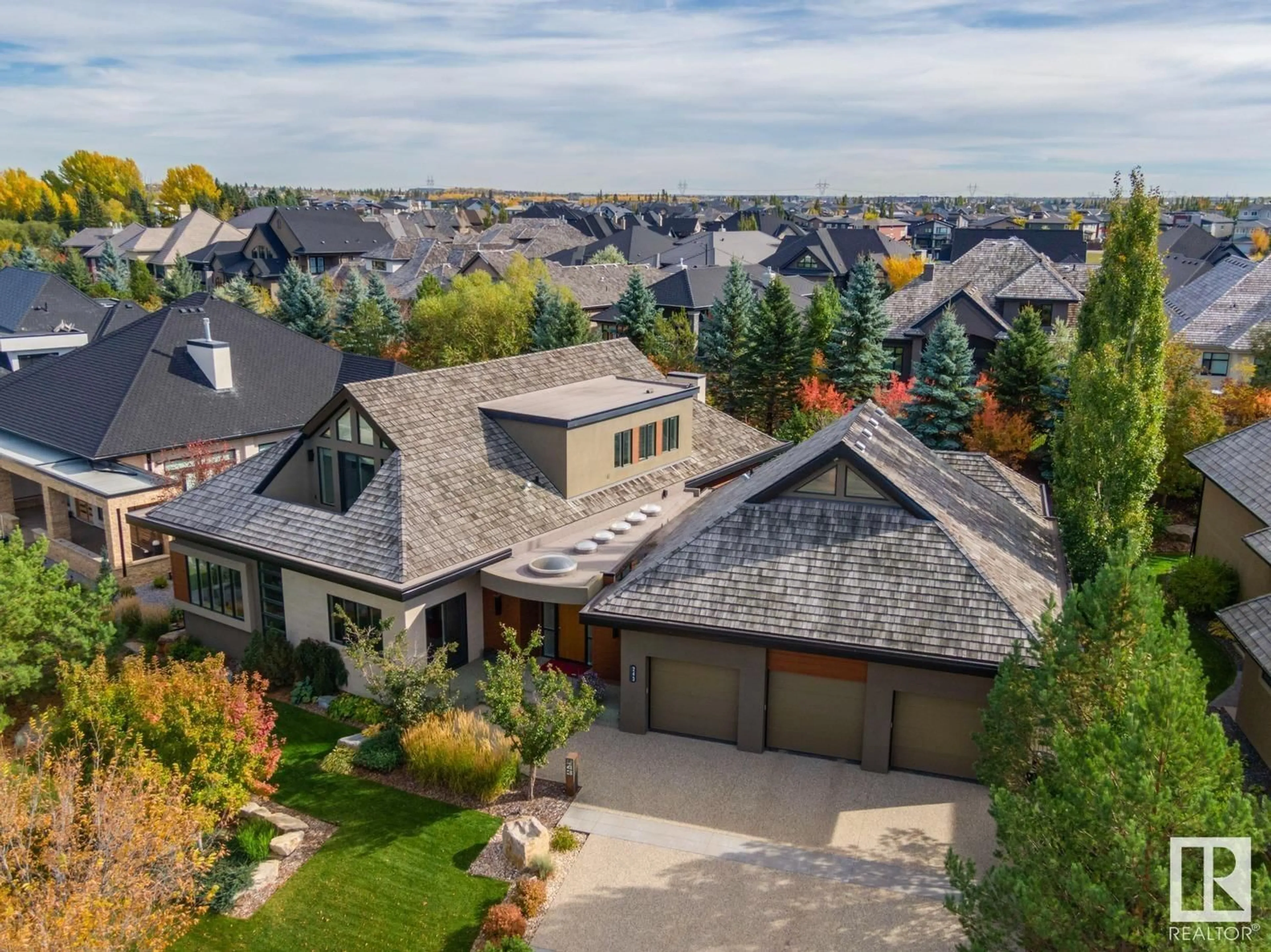 A pic from outside/outdoor area/front of a property/back of a property/a pic from drone, mountain view for 243 WINDERMERE DR NW, Edmonton Alberta T6W0S4