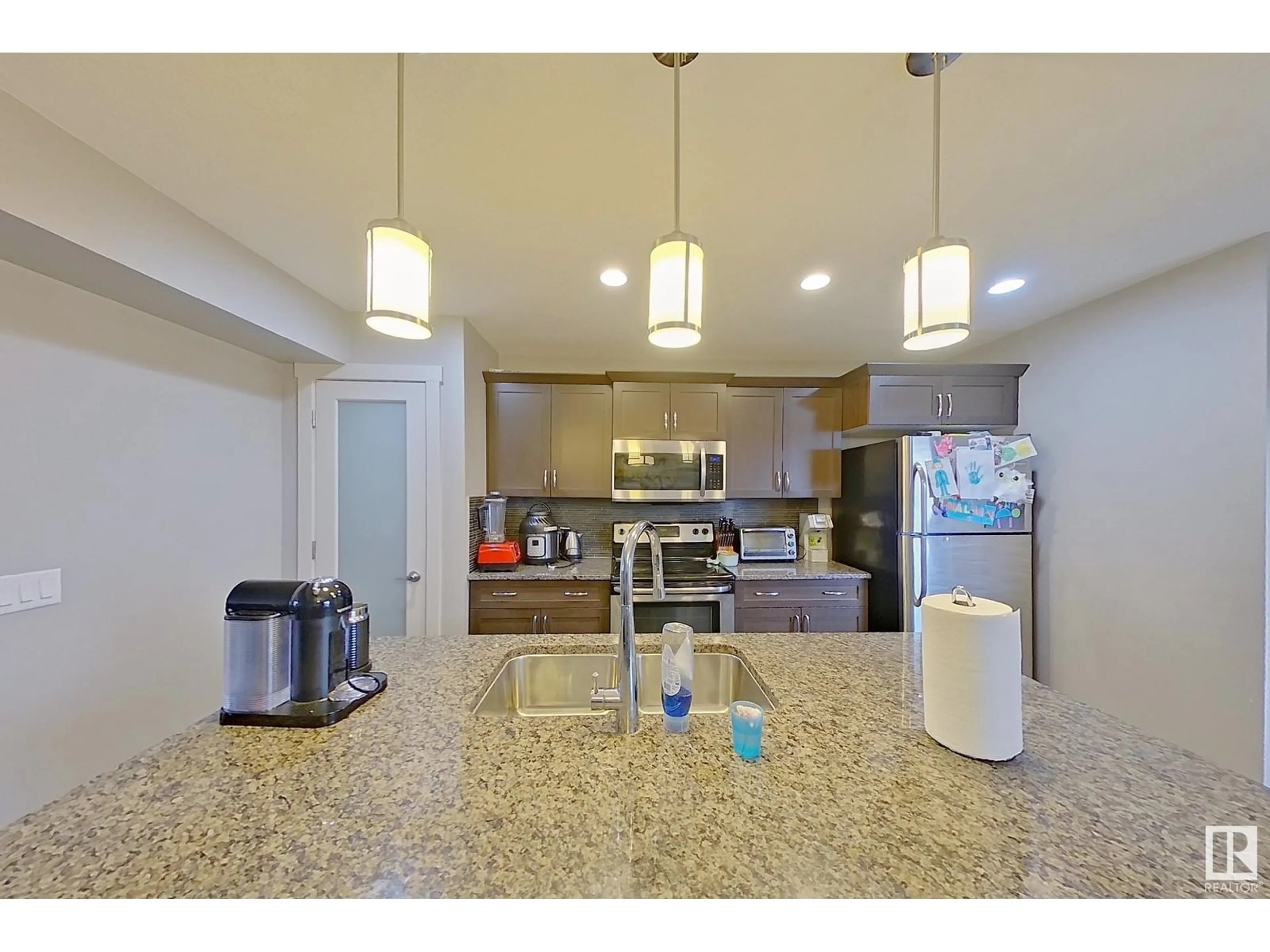 Open concept kitchen, ceramic/tile floor for 679 ALLARD BV SW, Edmonton Alberta T6W2V5