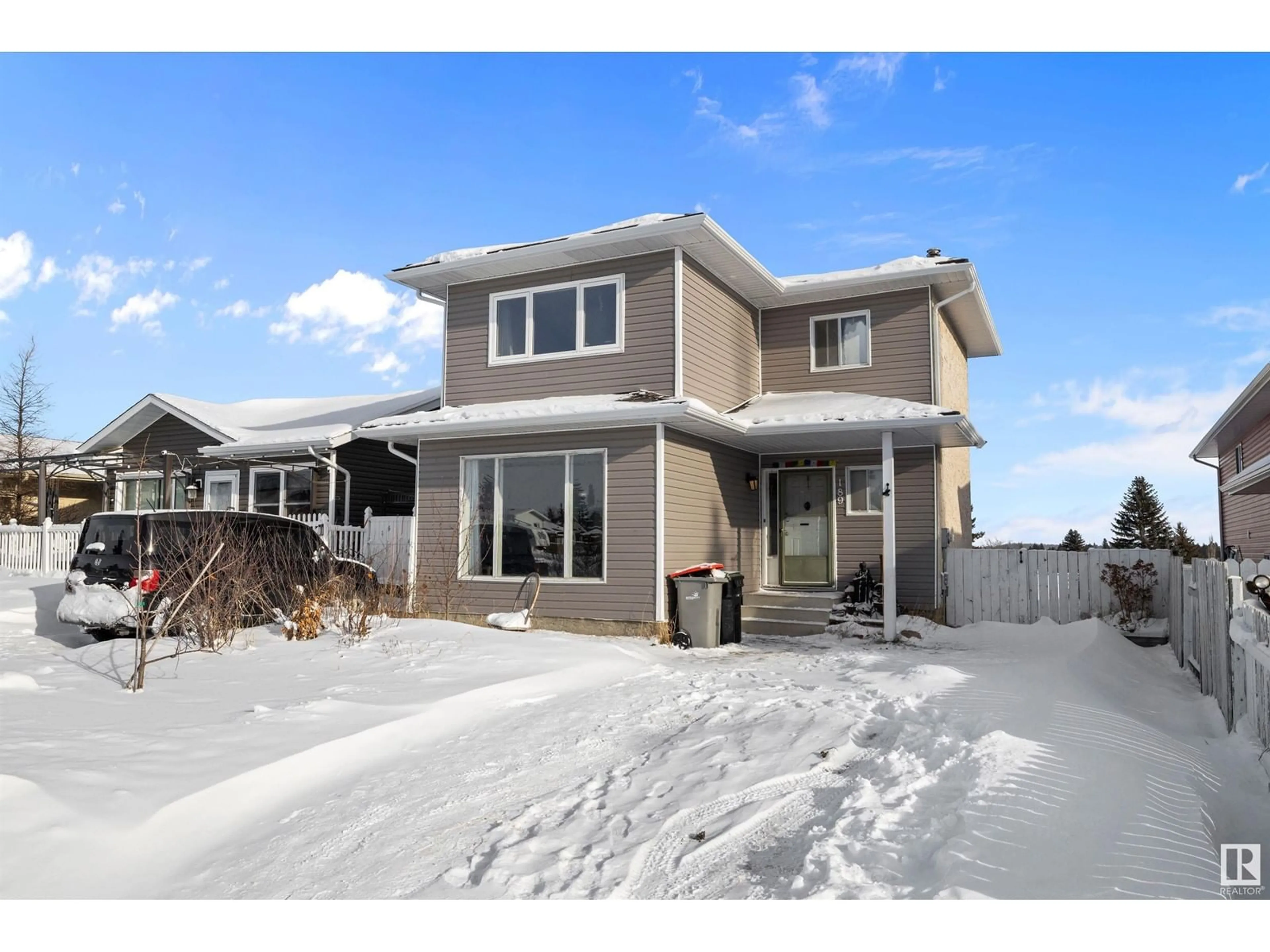 Home with vinyl exterior material, street for 189 WEST LIBERTY CR, Millet Alberta T0C1Z0