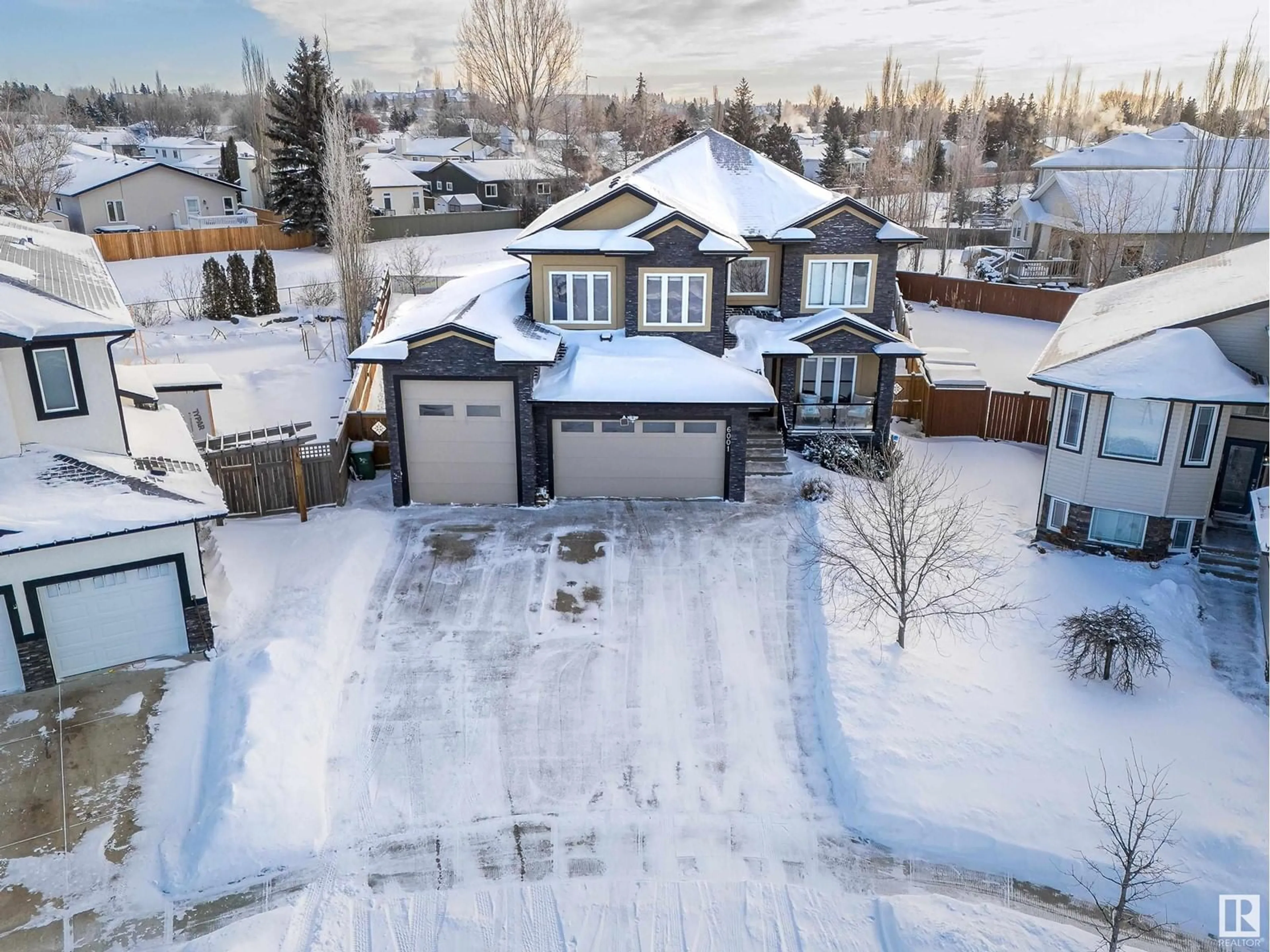 A pic from outside/outdoor area/front of a property/back of a property/a pic from drone, street for 6001 56 AV, Beaumont Alberta T4X0G8