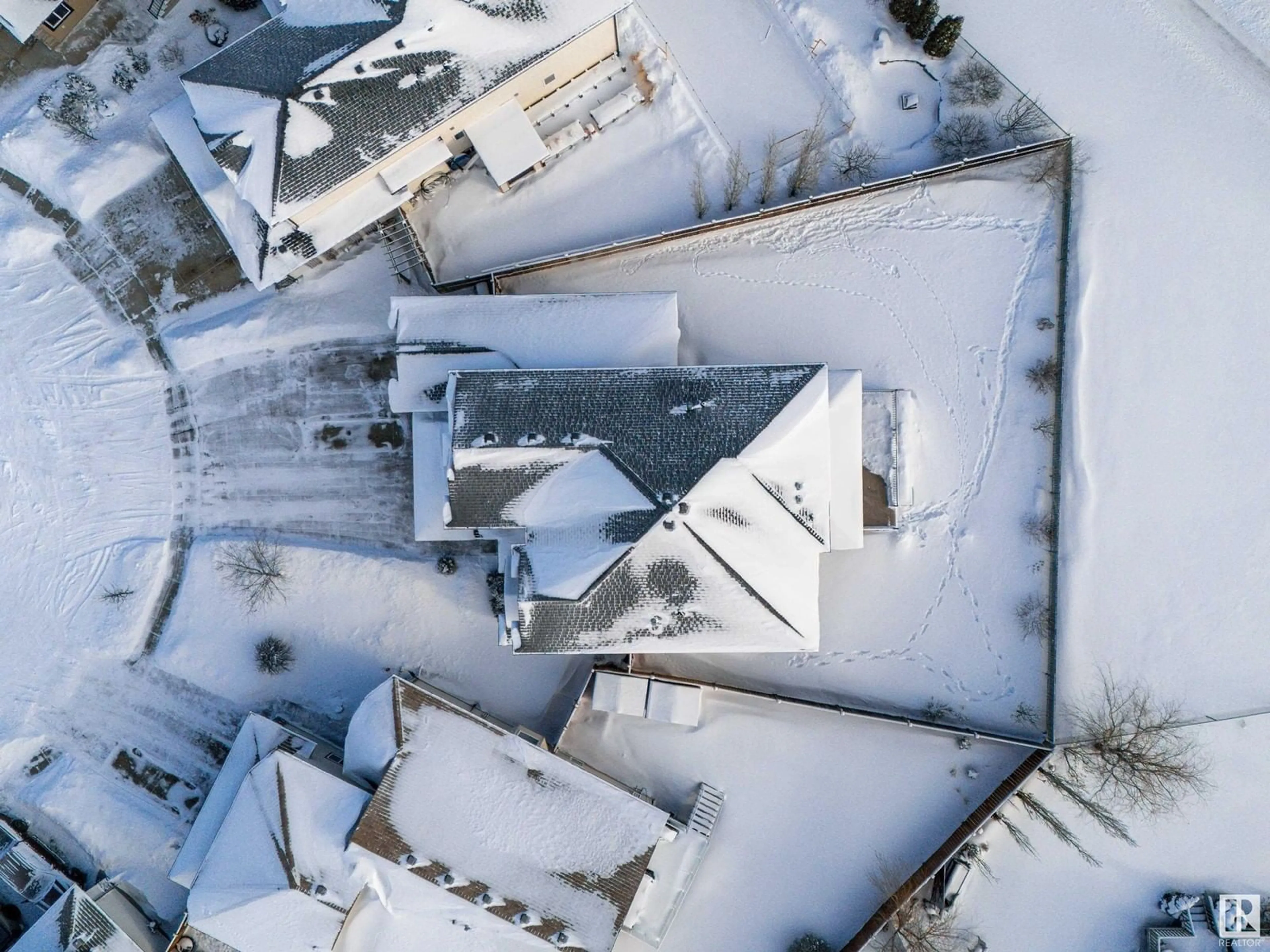 A pic from outside/outdoor area/front of a property/back of a property/a pic from drone, unknown for 6001 56 AV, Beaumont Alberta T4X0G8