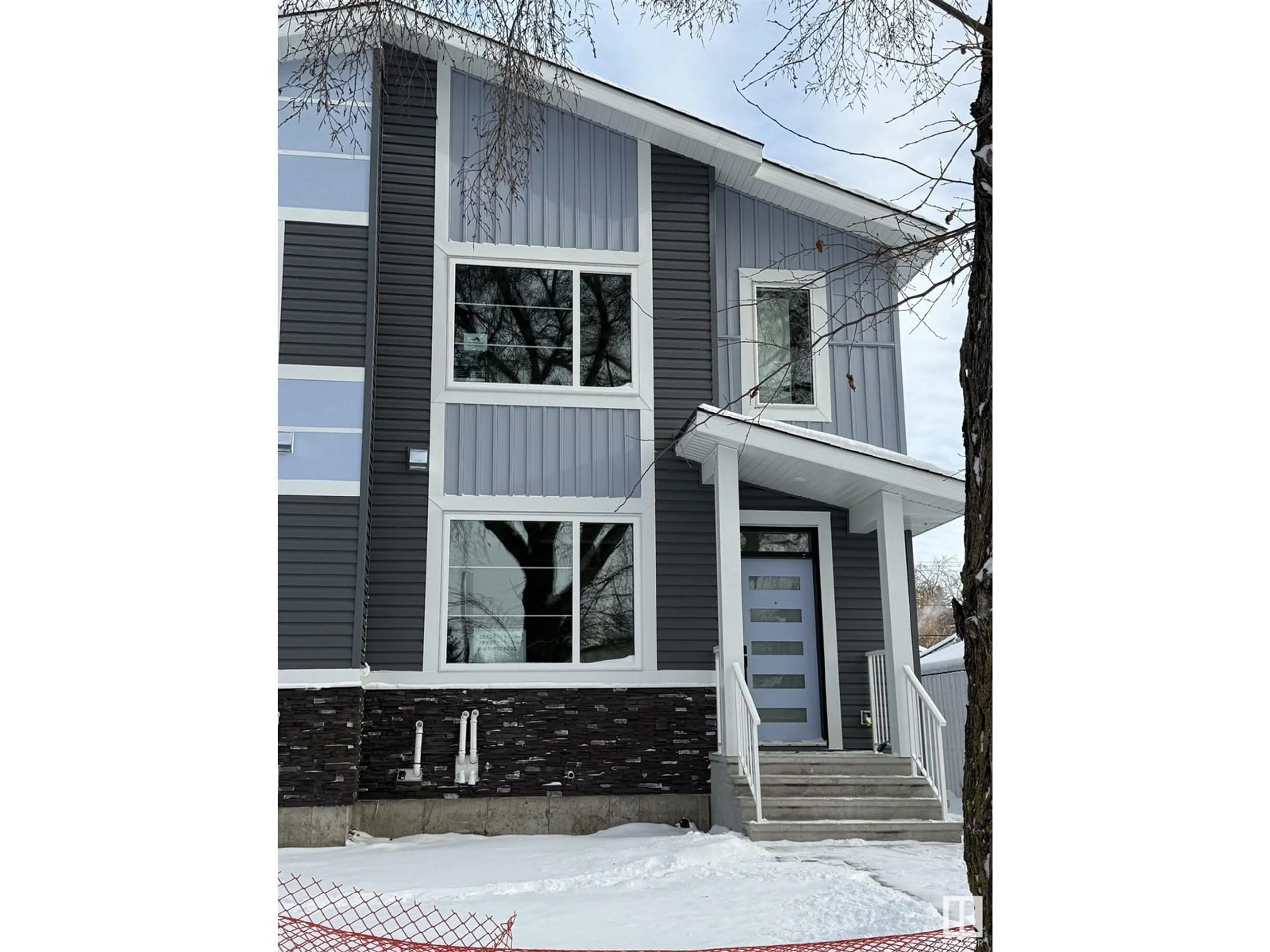 Home with vinyl exterior material, street for 12037 41 ST NW, Edmonton Alberta T5W2M3