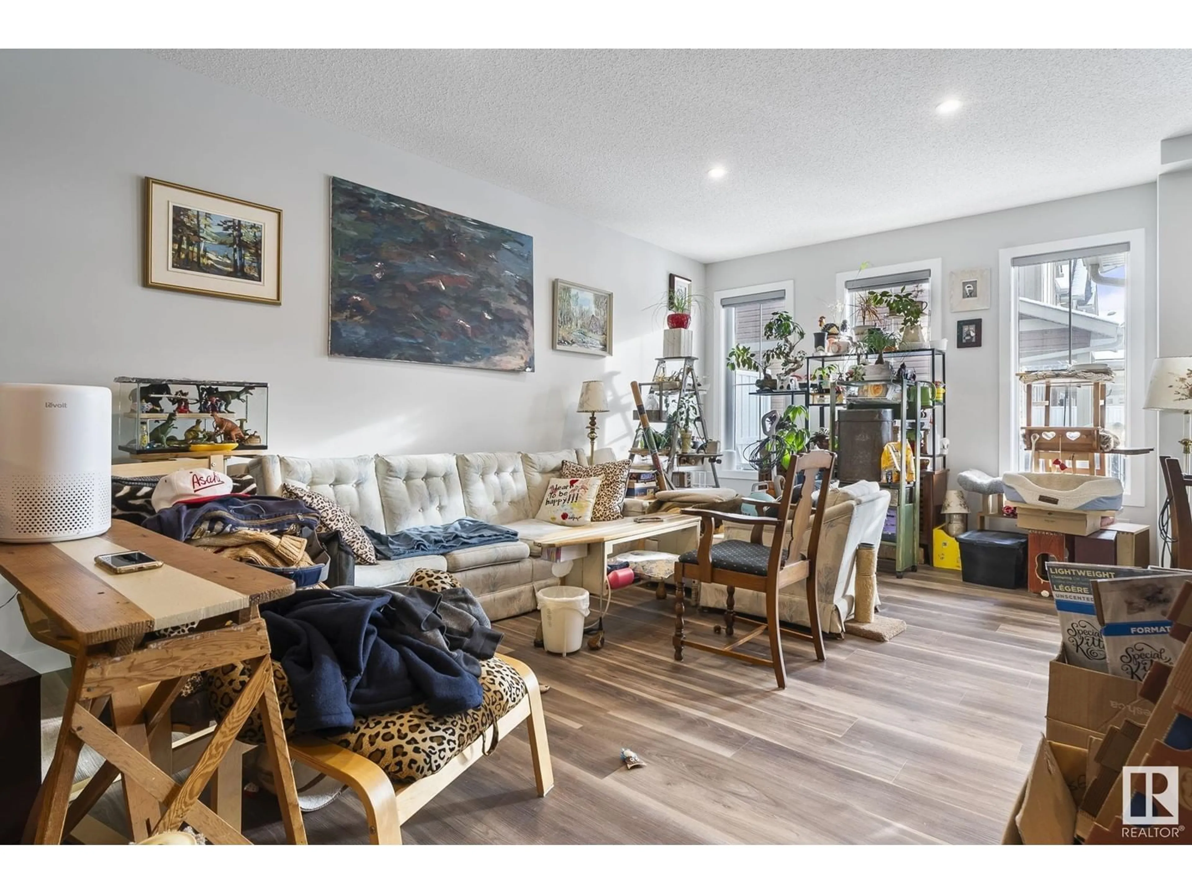 Living room with furniture, wood/laminate floor for #45 1051 Graydon Hill Blvd SW SW, Edmonton Alberta T6W3C8