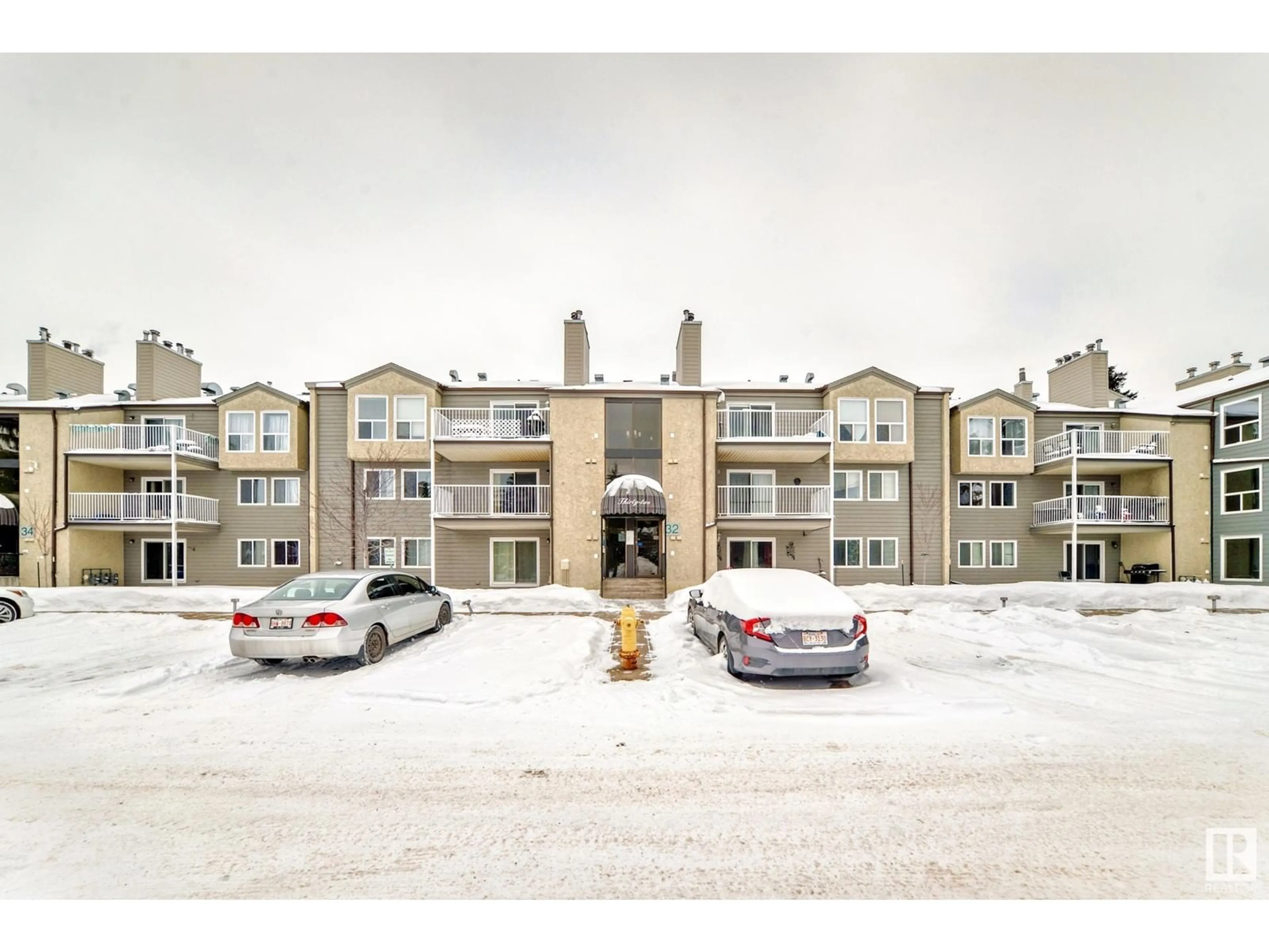 A pic from outside/outdoor area/front of a property/back of a property/a pic from drone, unknown for #207 32 ALPINE PL, St. Albert Alberta T8N3Y2