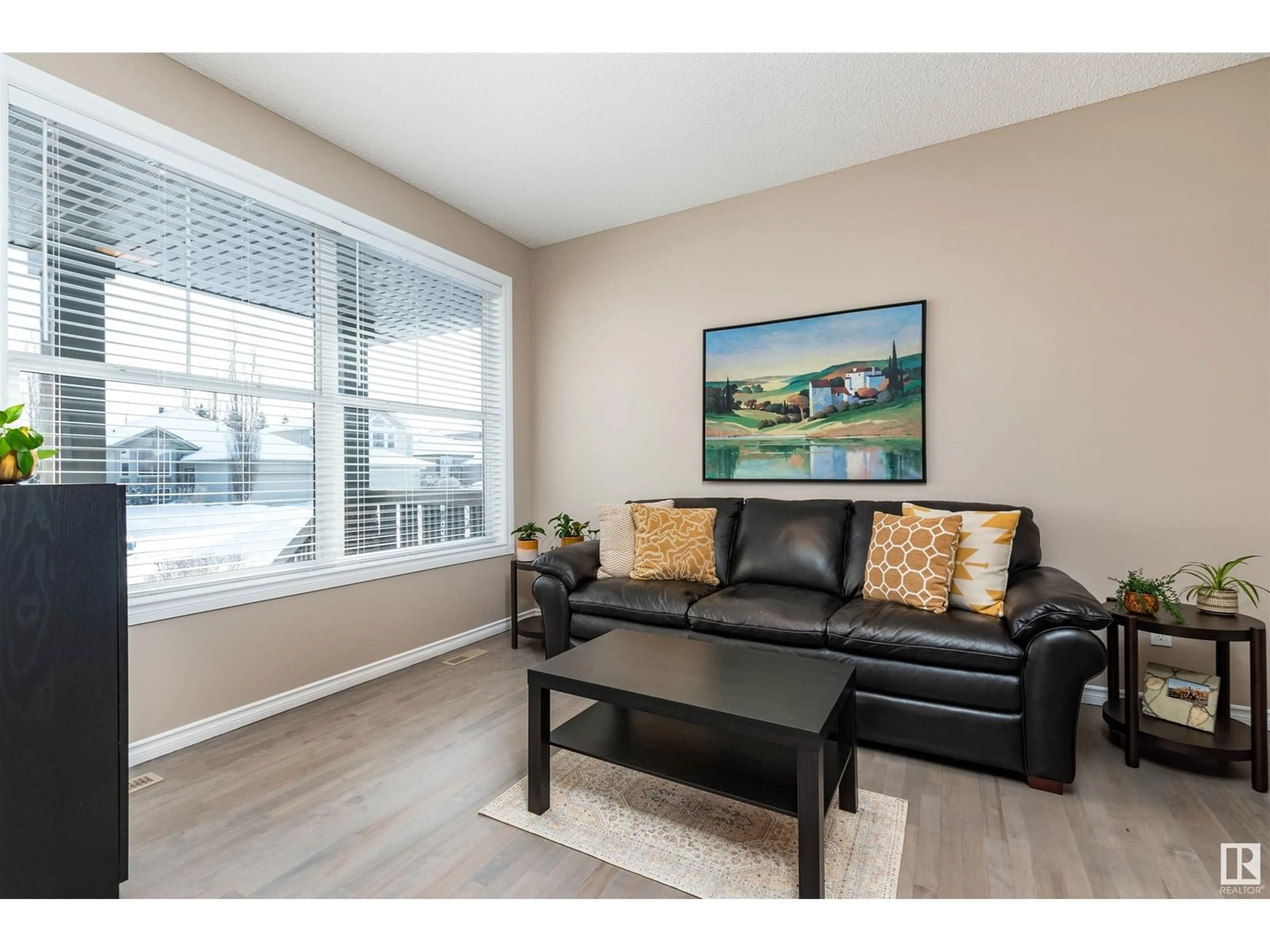 Living room with furniture, wood/laminate floor for 219 Ridgeland CR, Sherwood Park Alberta T8A2Z3