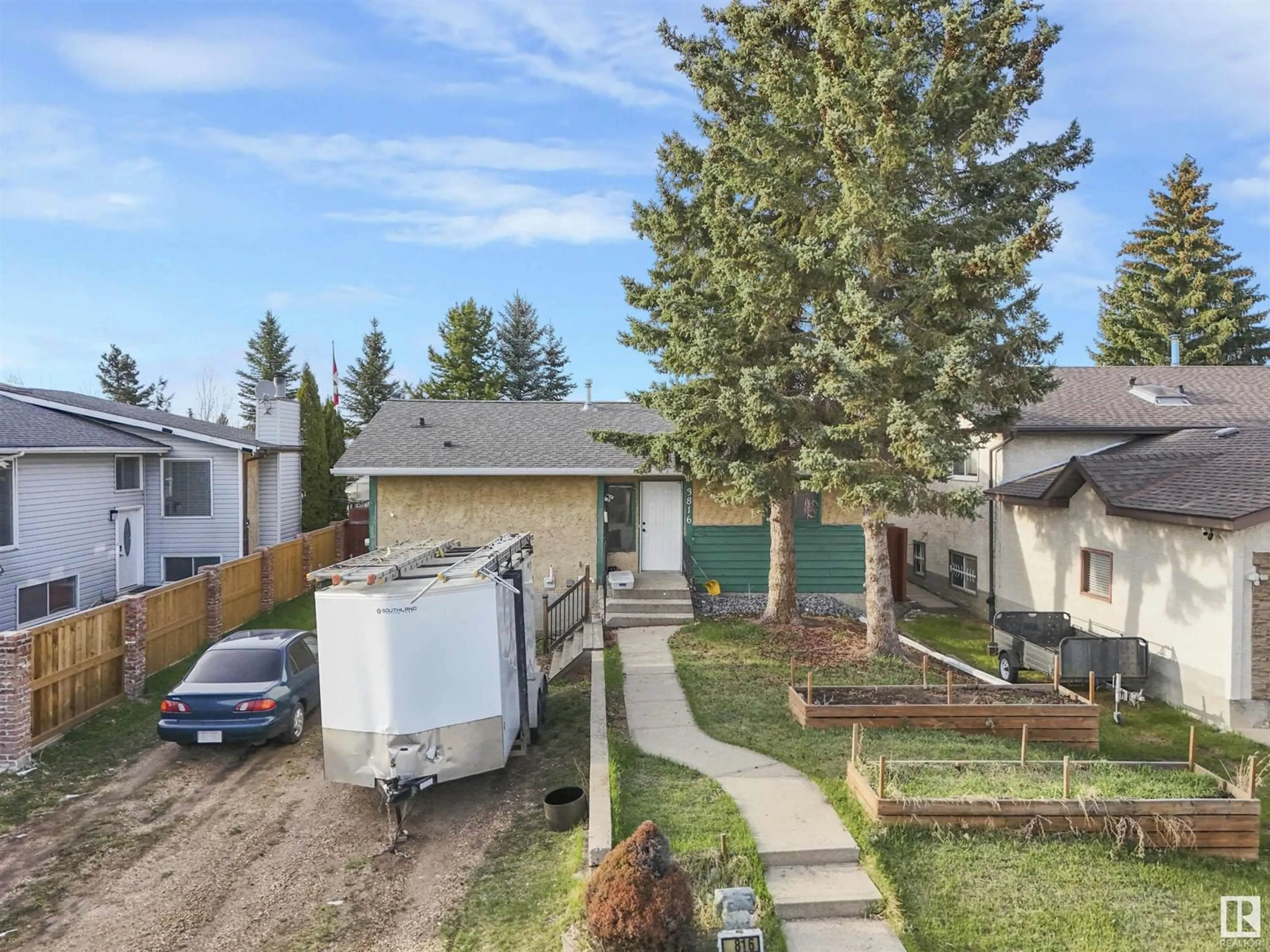 A pic from outside/outdoor area/front of a property/back of a property/a pic from drone, street for 3816 17B AV NW, Edmonton Alberta T6L3B9