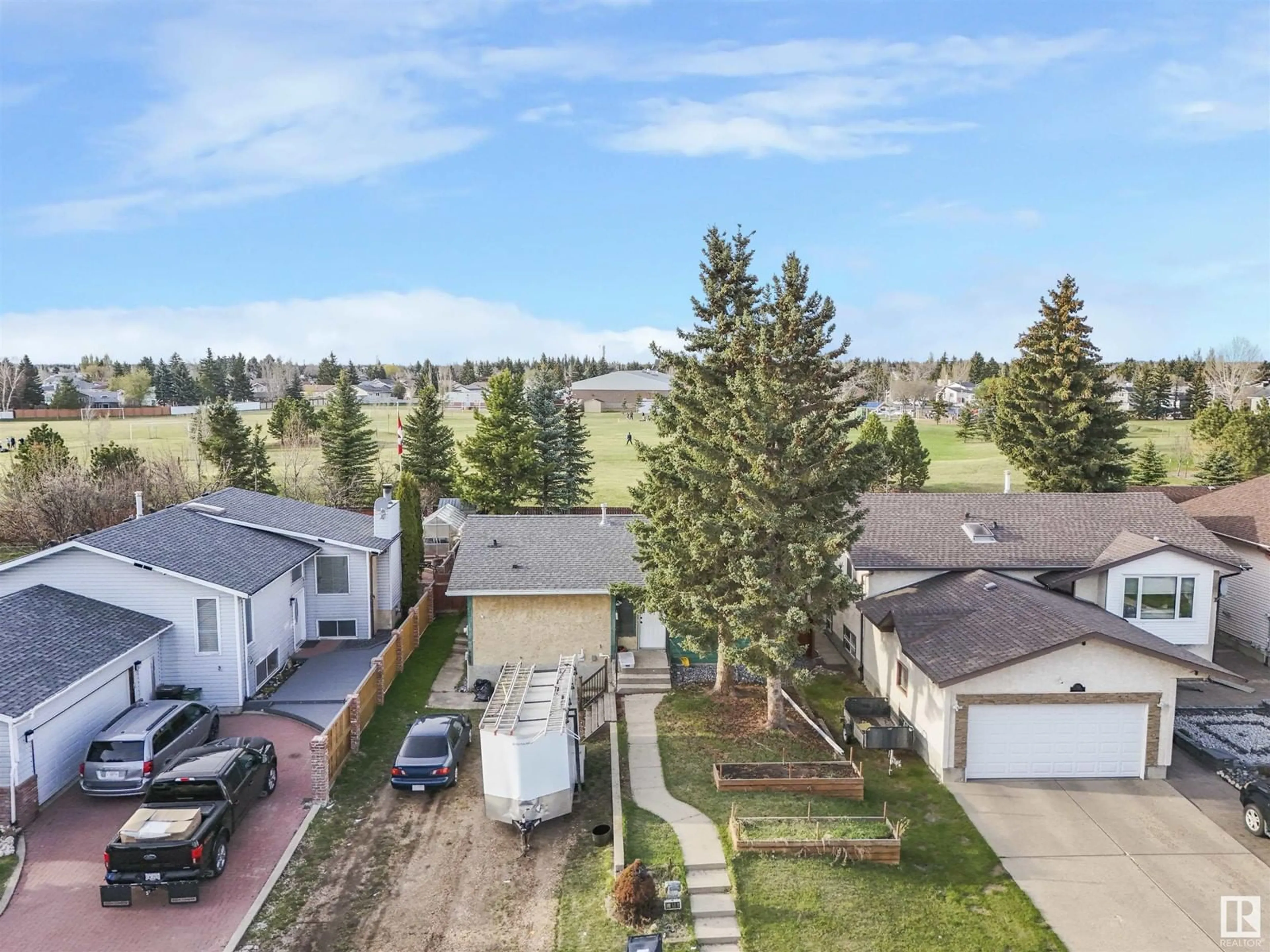 A pic from outside/outdoor area/front of a property/back of a property/a pic from drone, unknown for 3816 17B AV NW, Edmonton Alberta T6L3B9