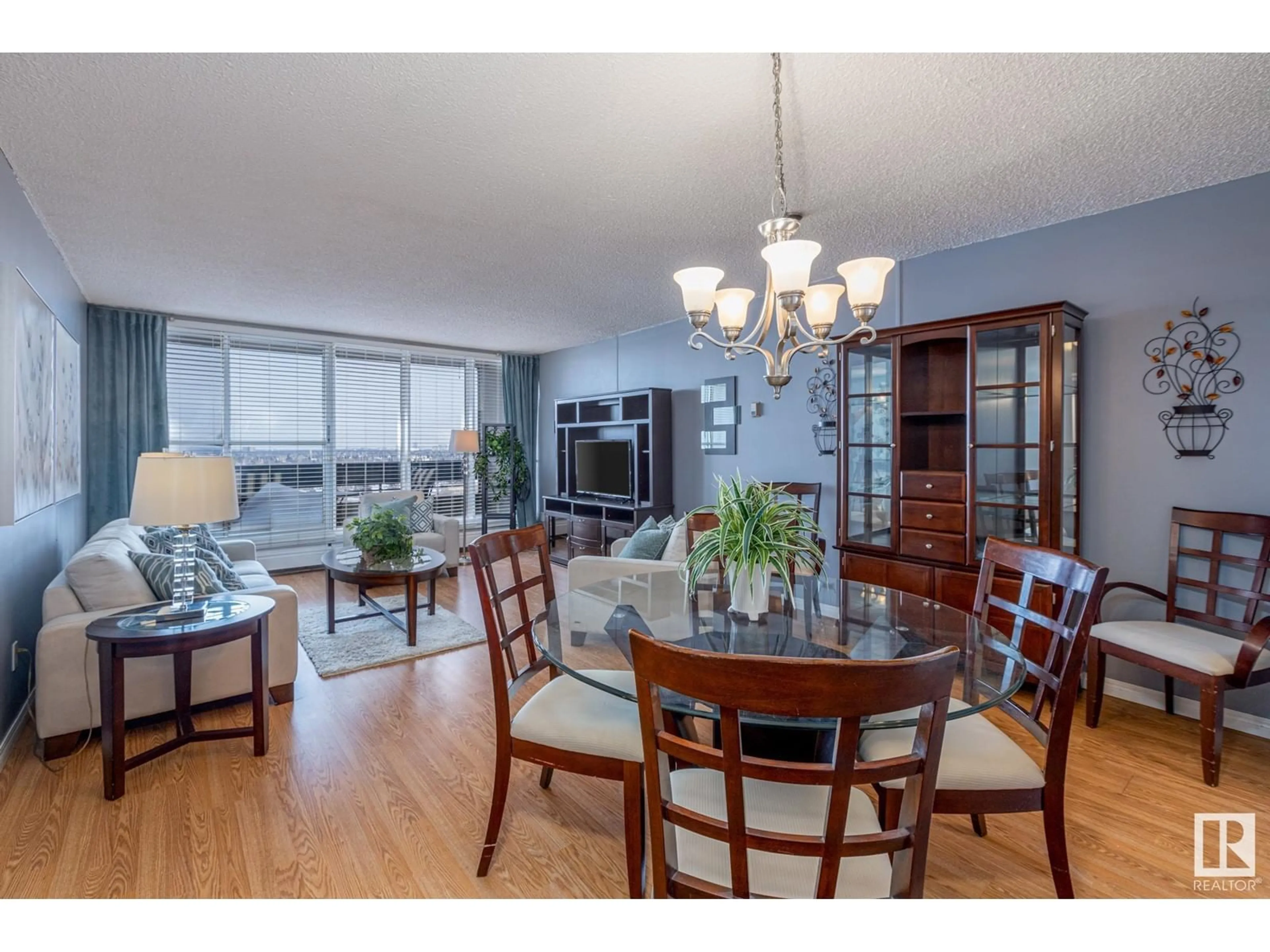 Dining room, wood/laminate floor for #133 8745 165 ST NW, Edmonton Alberta T5R2R6