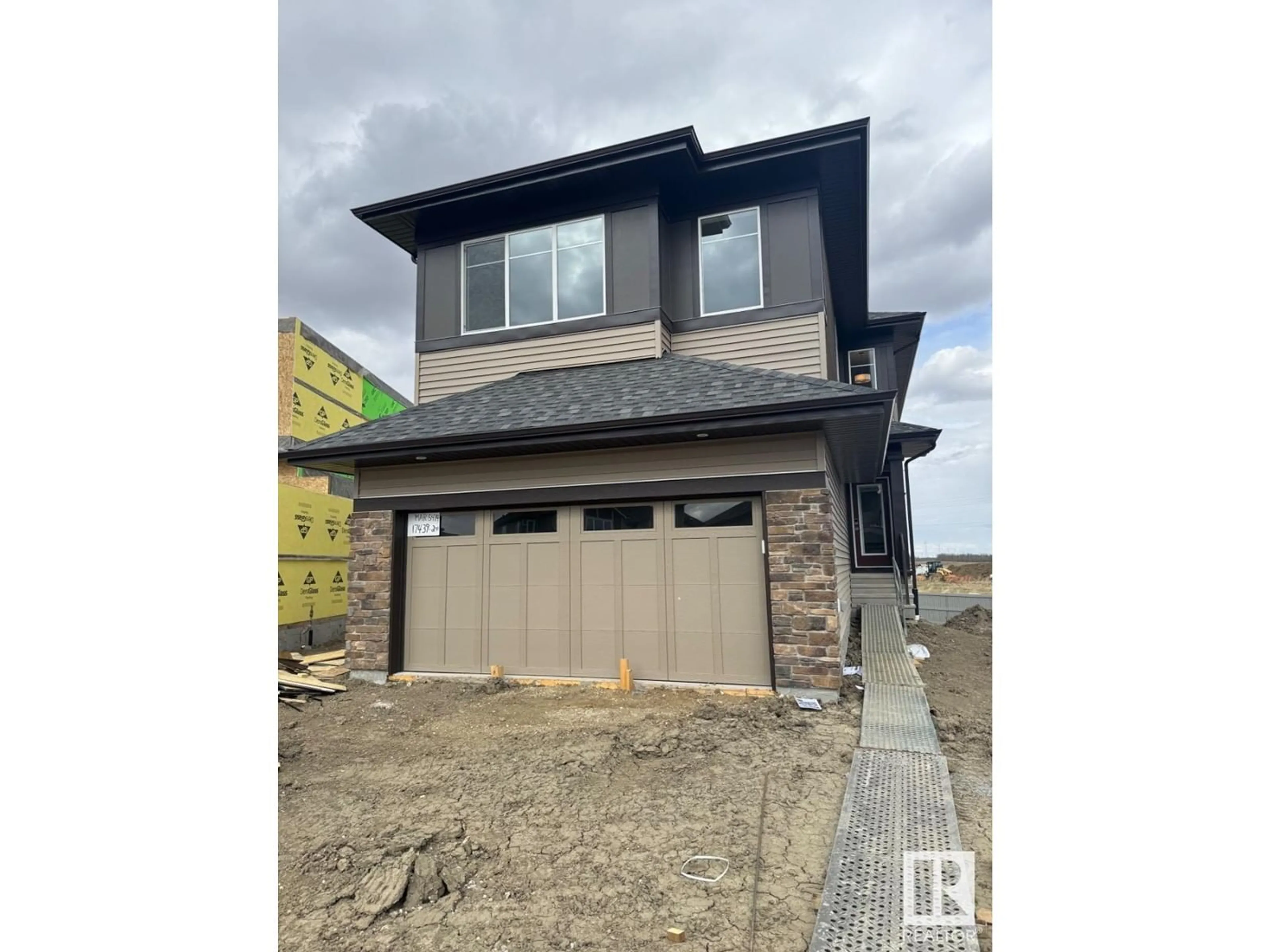 Home with brick exterior material, street for 17439 2 ST, Edmonton Alberta T5Y4G6