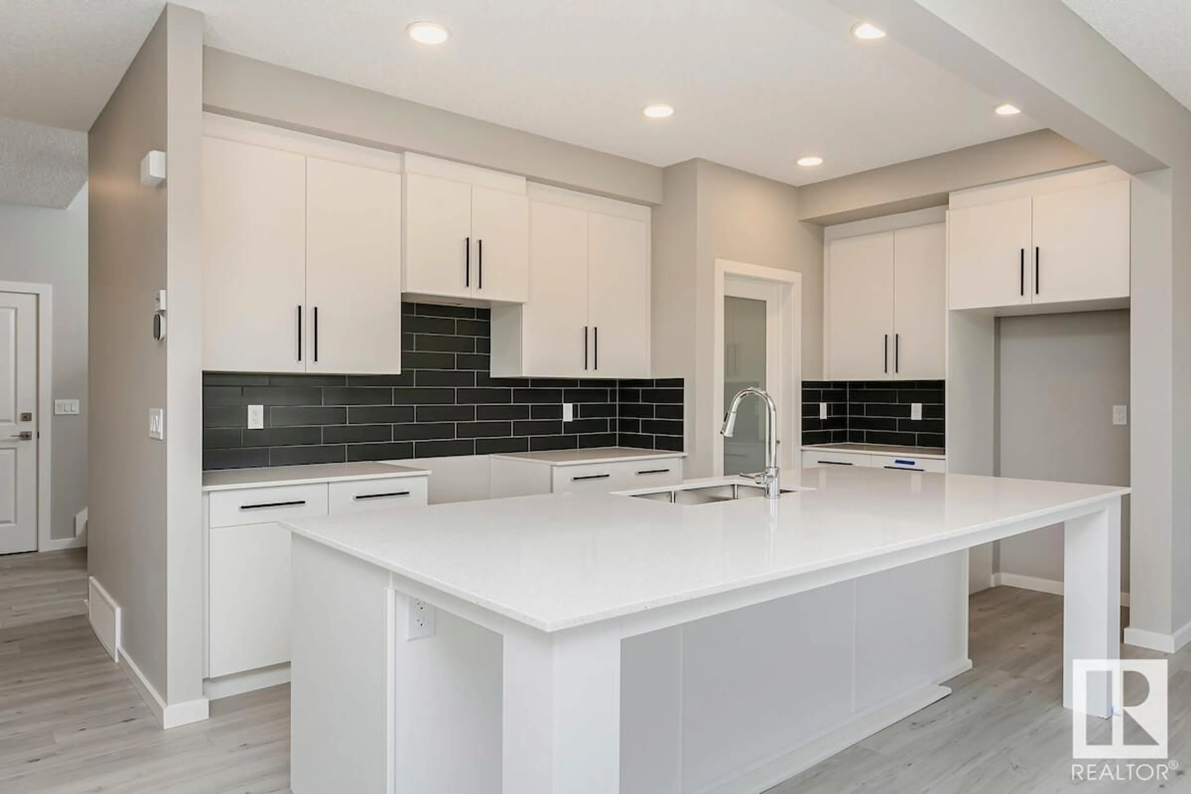 Open concept kitchen, ceramic/tile floor for 17439 2 ST, Edmonton Alberta T5Y4G6