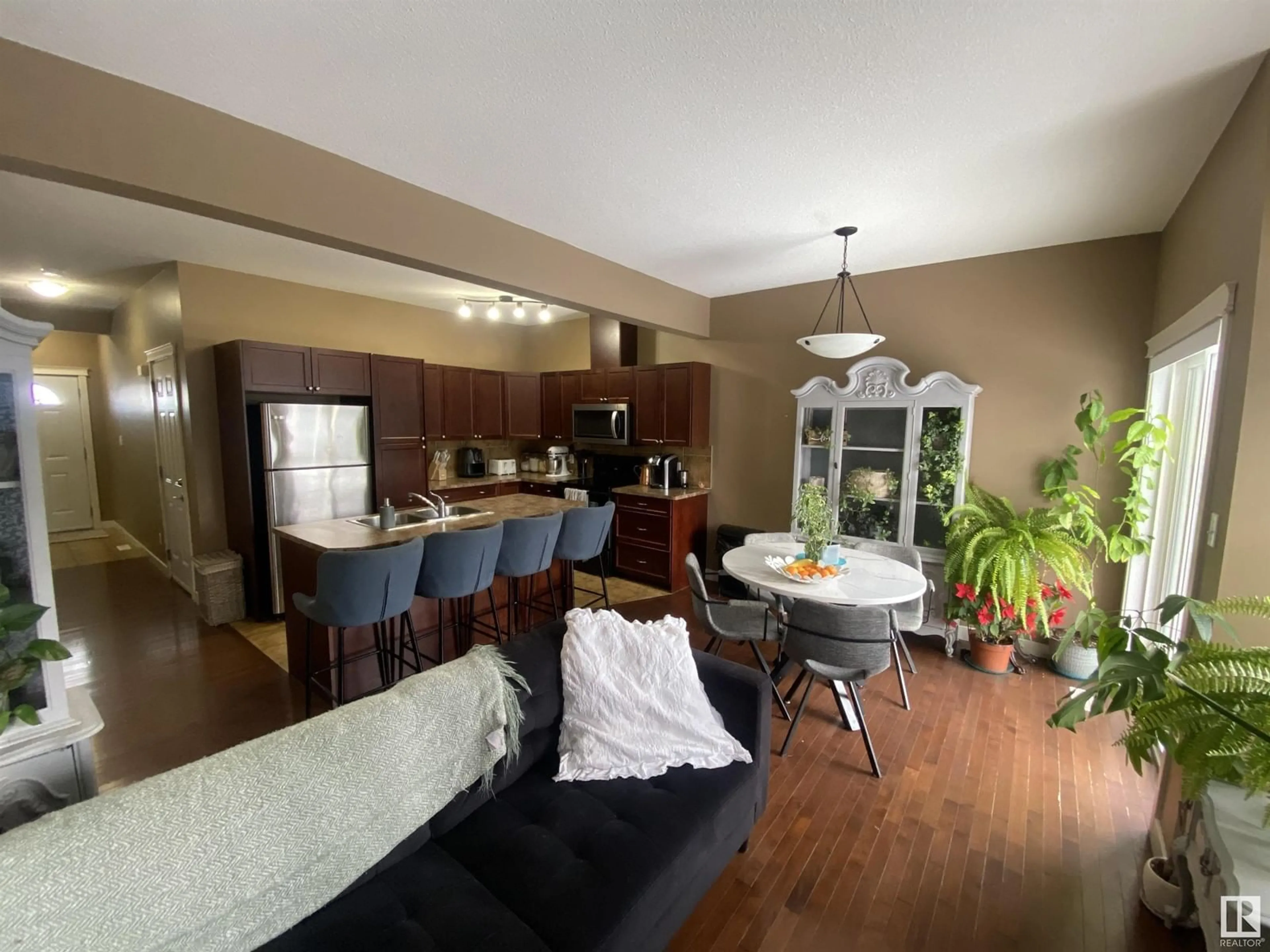 Open concept kitchen, wood/laminate floor for 101 SANDSTONE ES, Stony Plain Alberta T7Z0E2