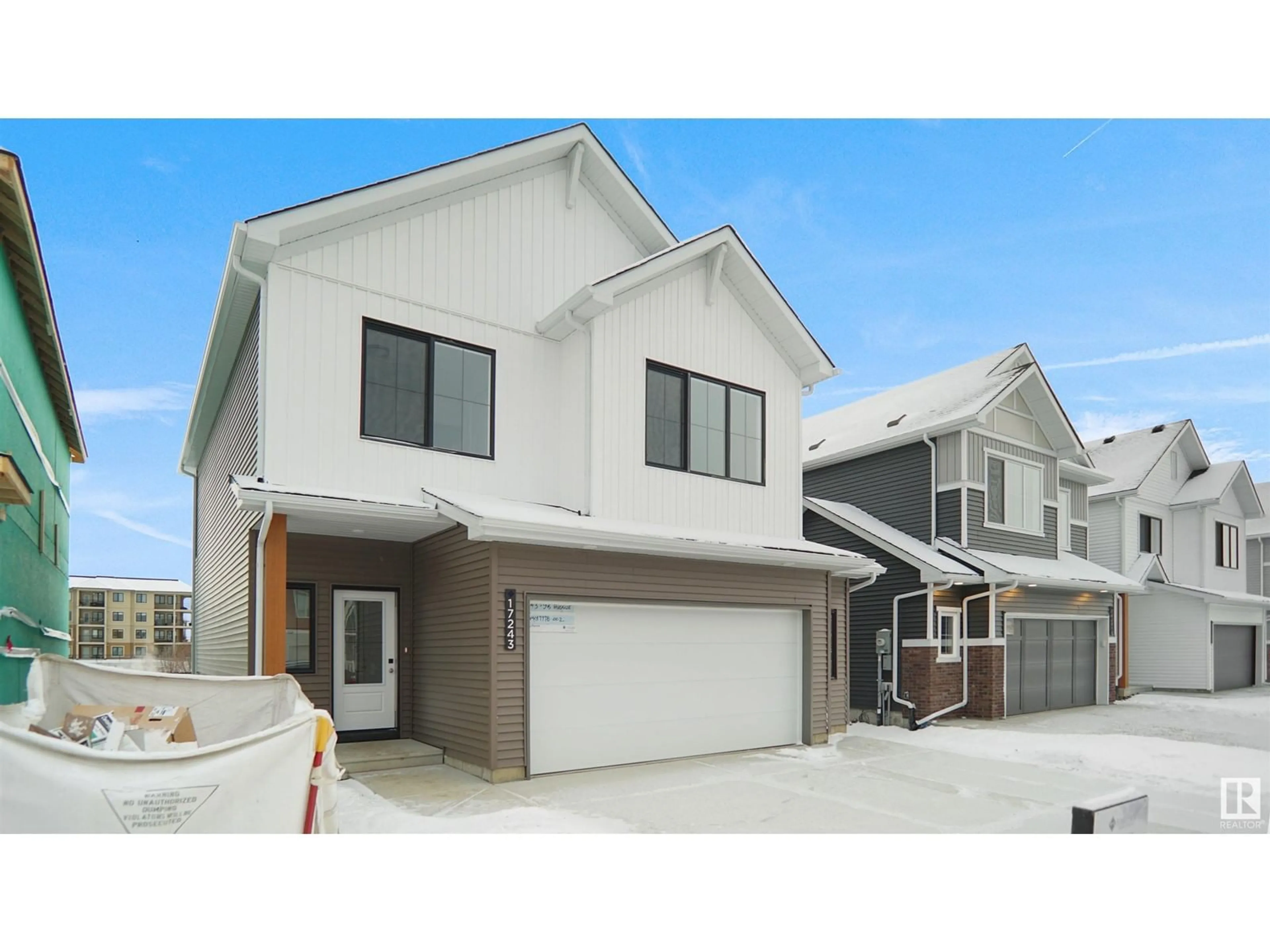 Home with vinyl exterior material, street for 17237 9B AV NW, Edmonton Alberta T6W3V5