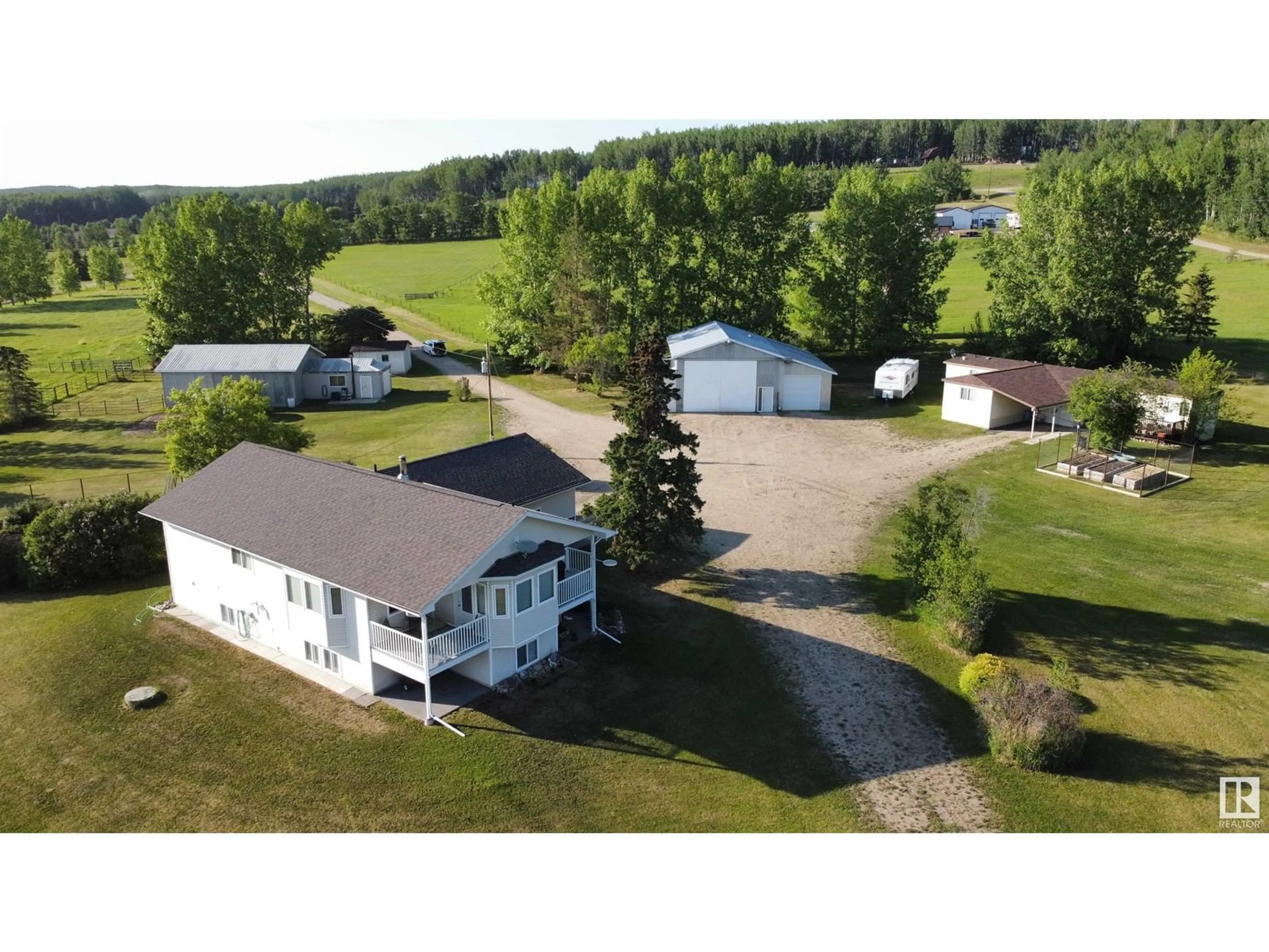 A pic from outside/outdoor area/front of a property/back of a property/a pic from drone, unknown for 7523 A & B TWP 505, Rural Brazeau County Alberta T7A2A2