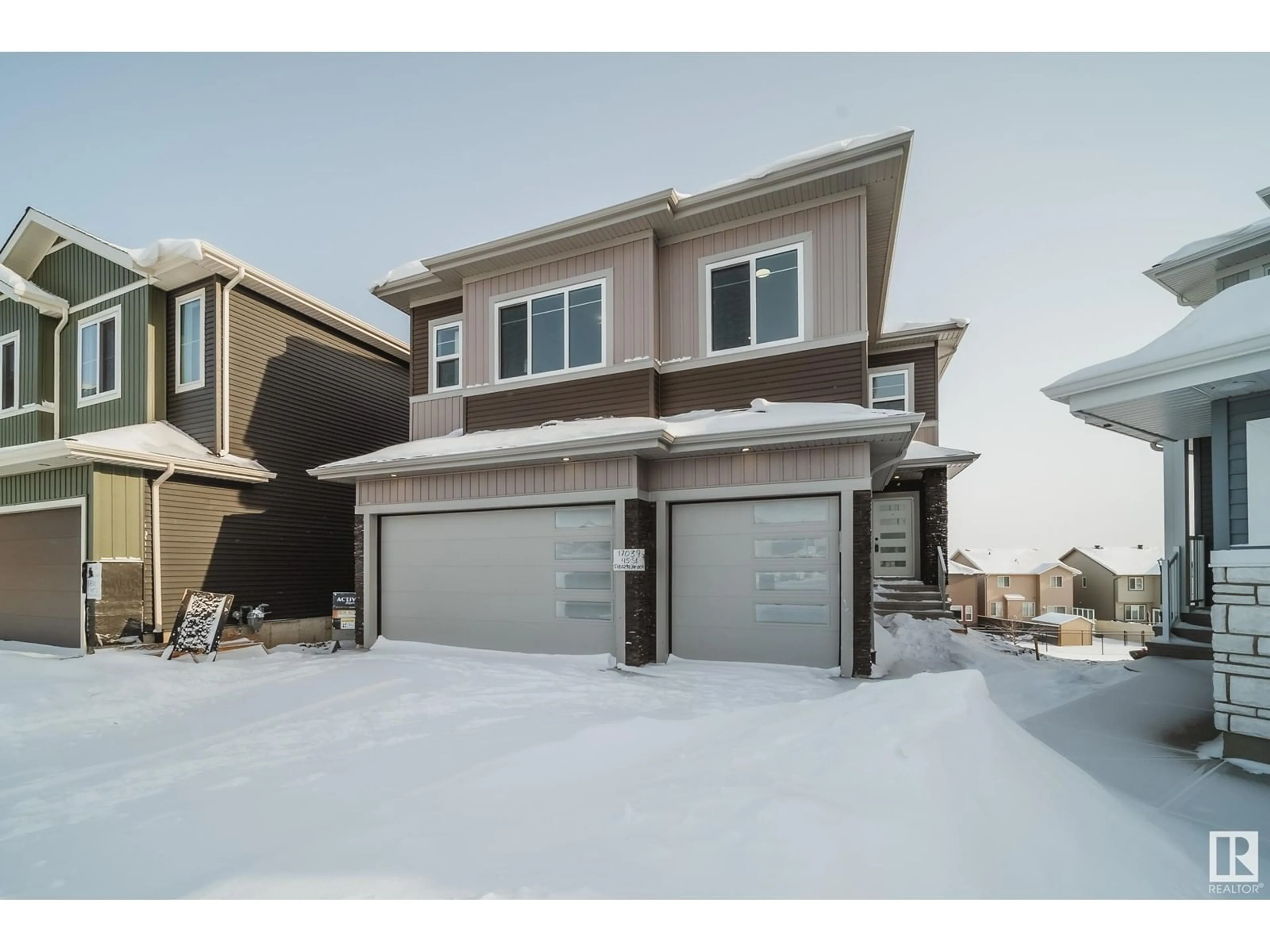 Home with vinyl exterior material, street for 17039 45 ST NW, Edmonton Alberta T5Y4C9