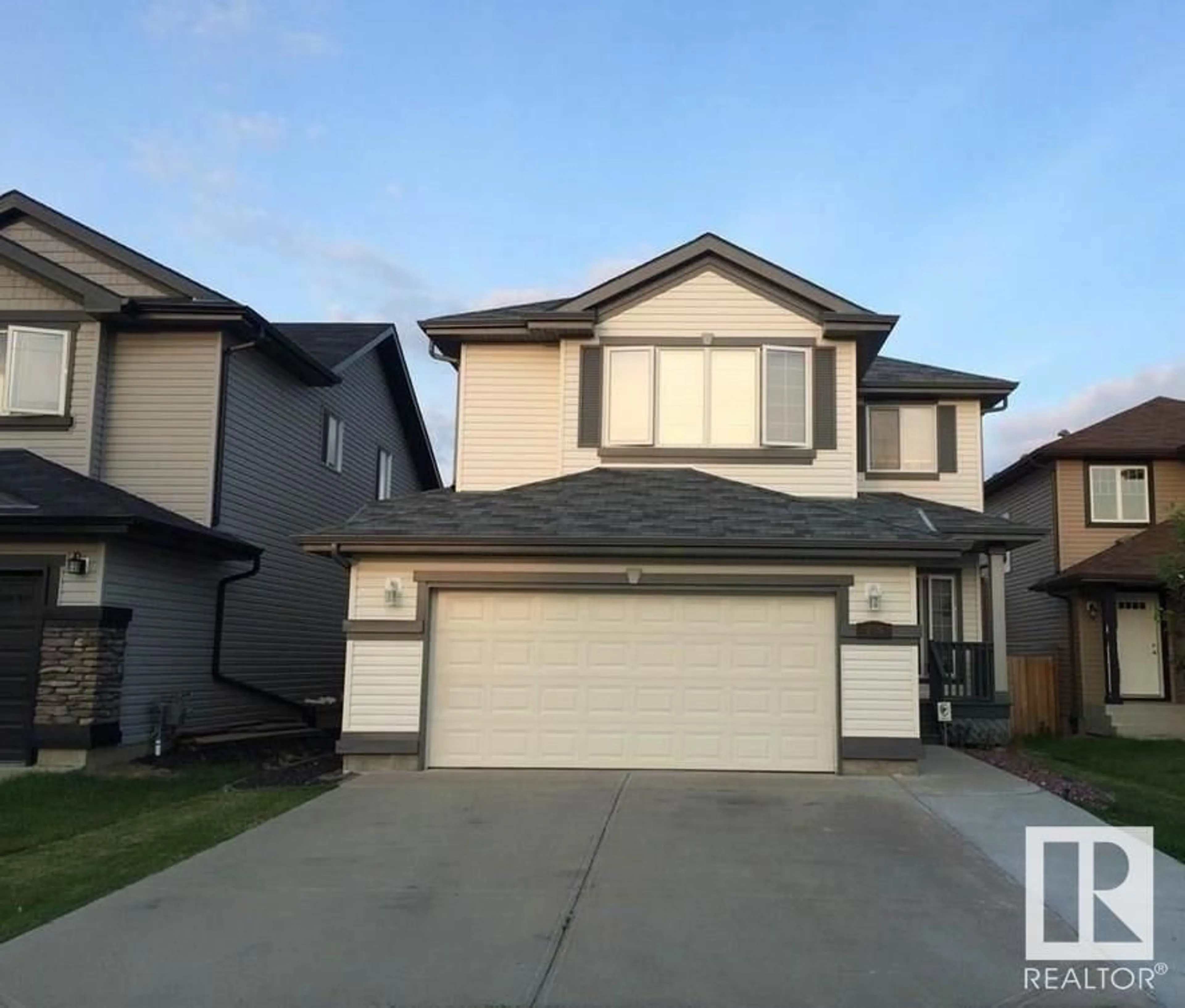 Home with vinyl exterior material, street for 16403 37 ST NW, Edmonton Alberta T5Y0H9