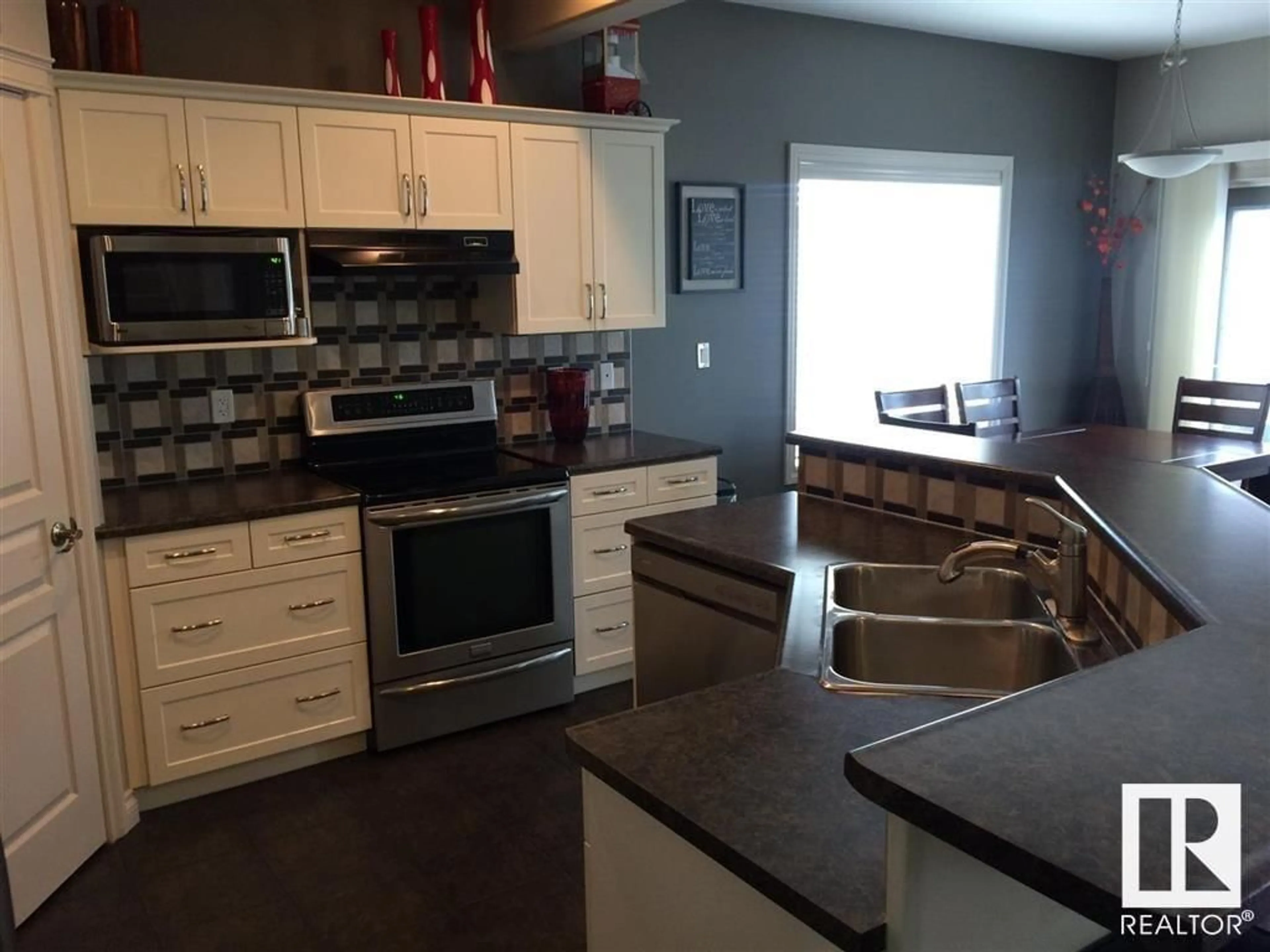 Open concept kitchen, unknown for 16403 37 ST NW, Edmonton Alberta T5Y0H9