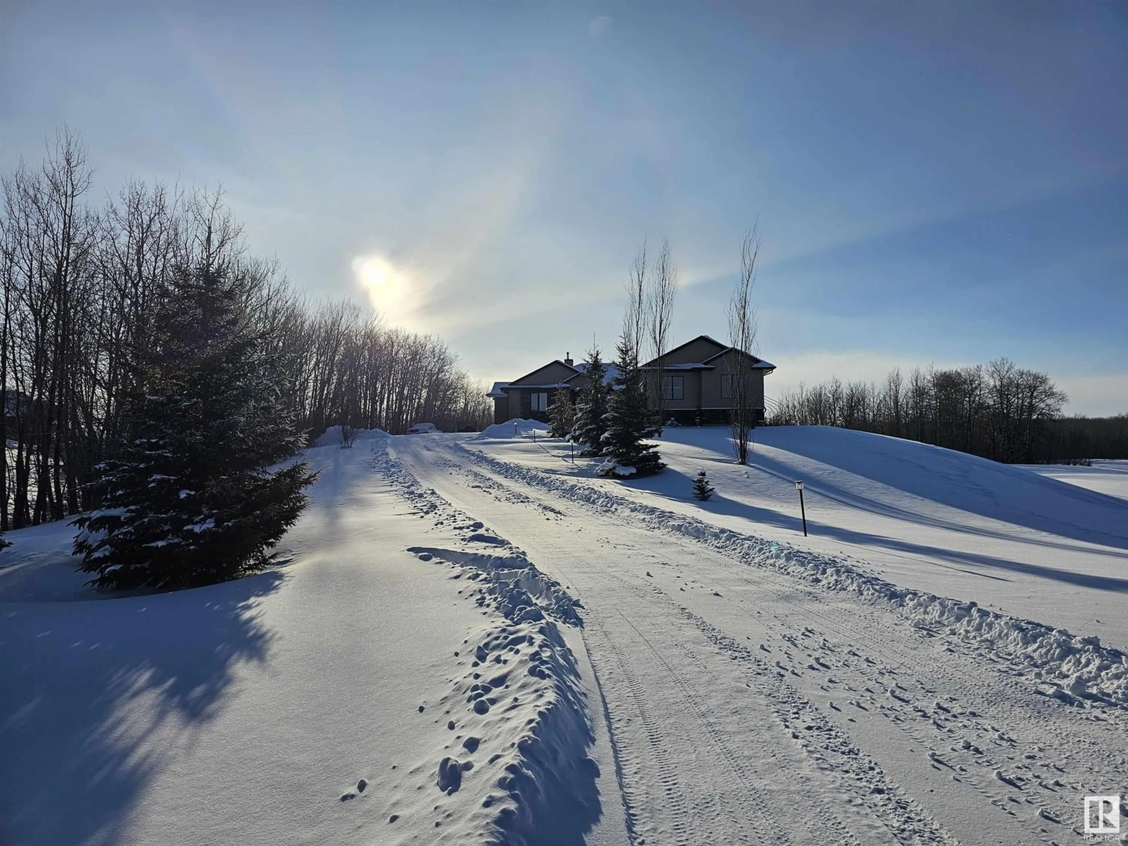 A pic from outside/outdoor area/front of a property/back of a property/a pic from drone, unknown for #5 54514 RGE ROAD 12, Rural Lac Ste. Anne County Alberta T0E1V2