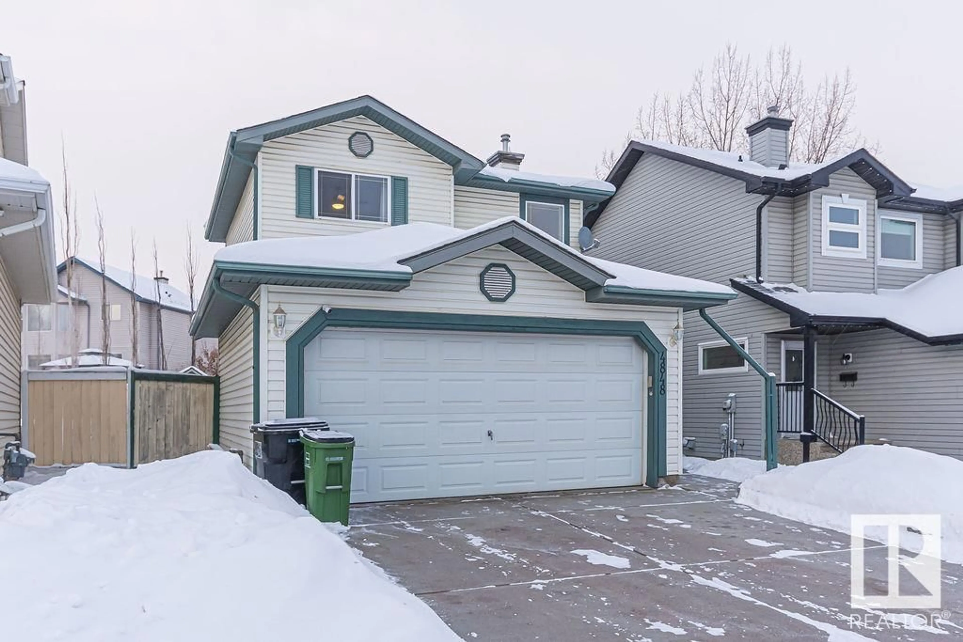 A pic from outside/outdoor area/front of a property/back of a property/a pic from drone, street for 4848 148 AV NW, Edmonton Alberta T5Y2X1