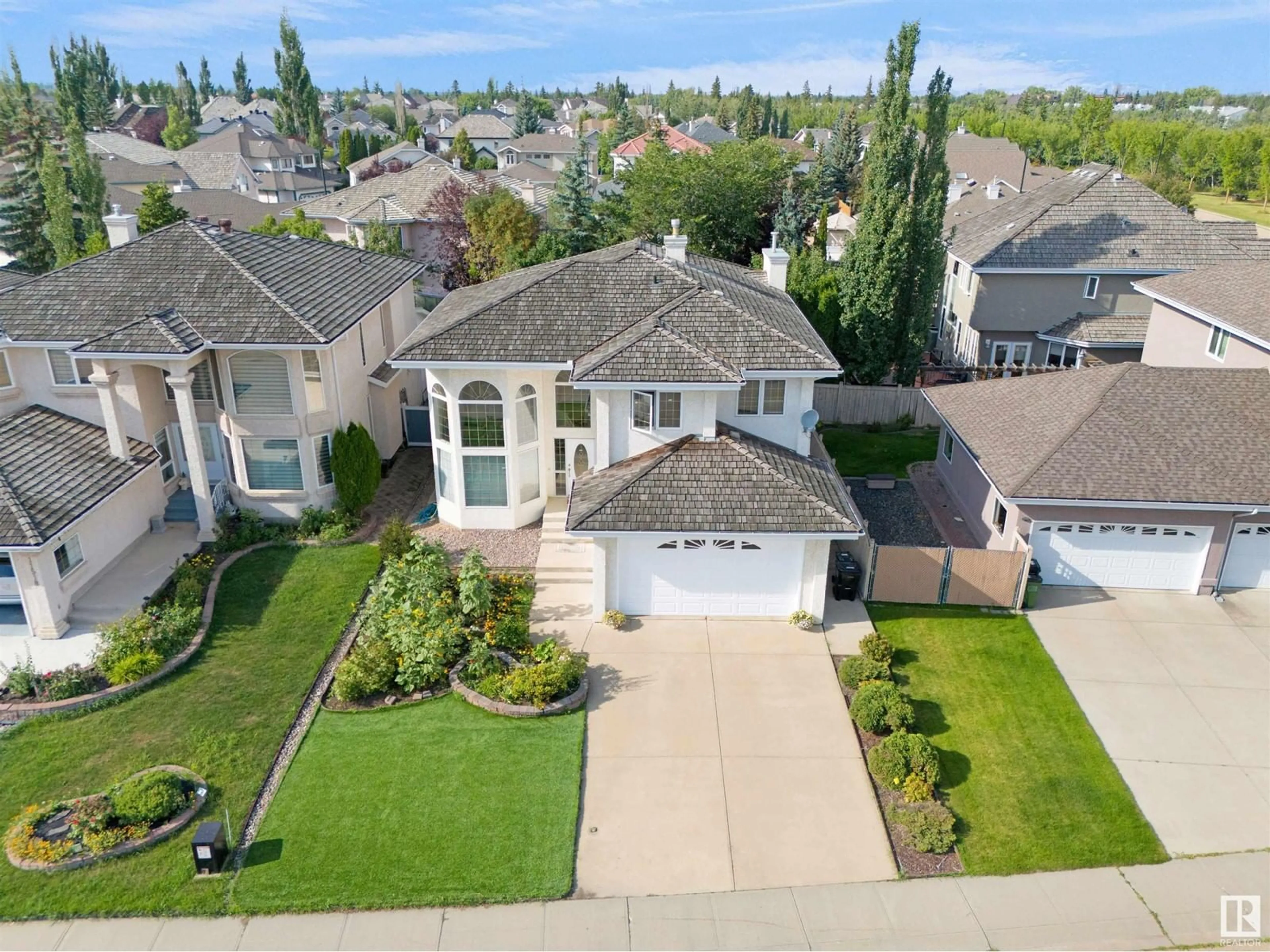 A pic from outside/outdoor area/front of a property/back of a property/a pic from drone, street for 11514 13 AV NW, Edmonton Alberta T6J6X3