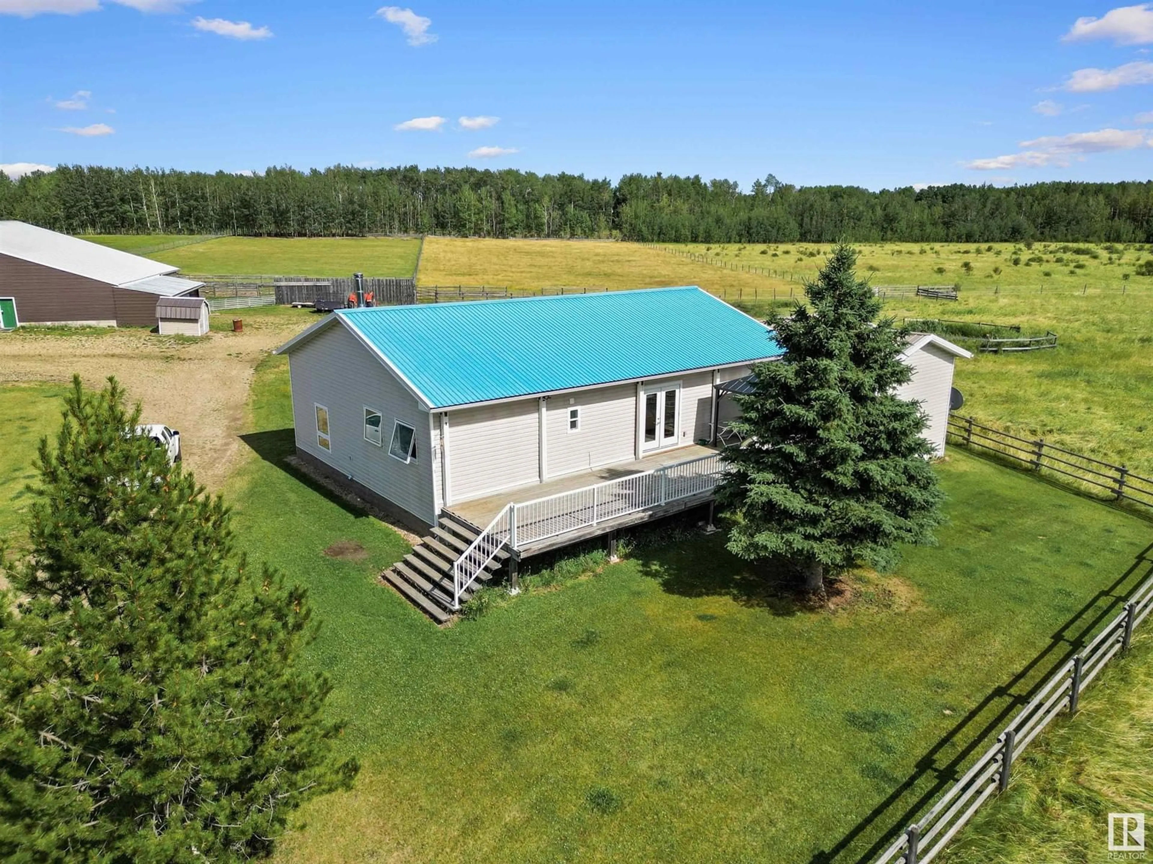 A pic from outside/outdoor area/front of a property/back of a property/a pic from drone, building for 452057 RGE RD 70A, Rural Wetaskiwin County Alberta T0C0A0