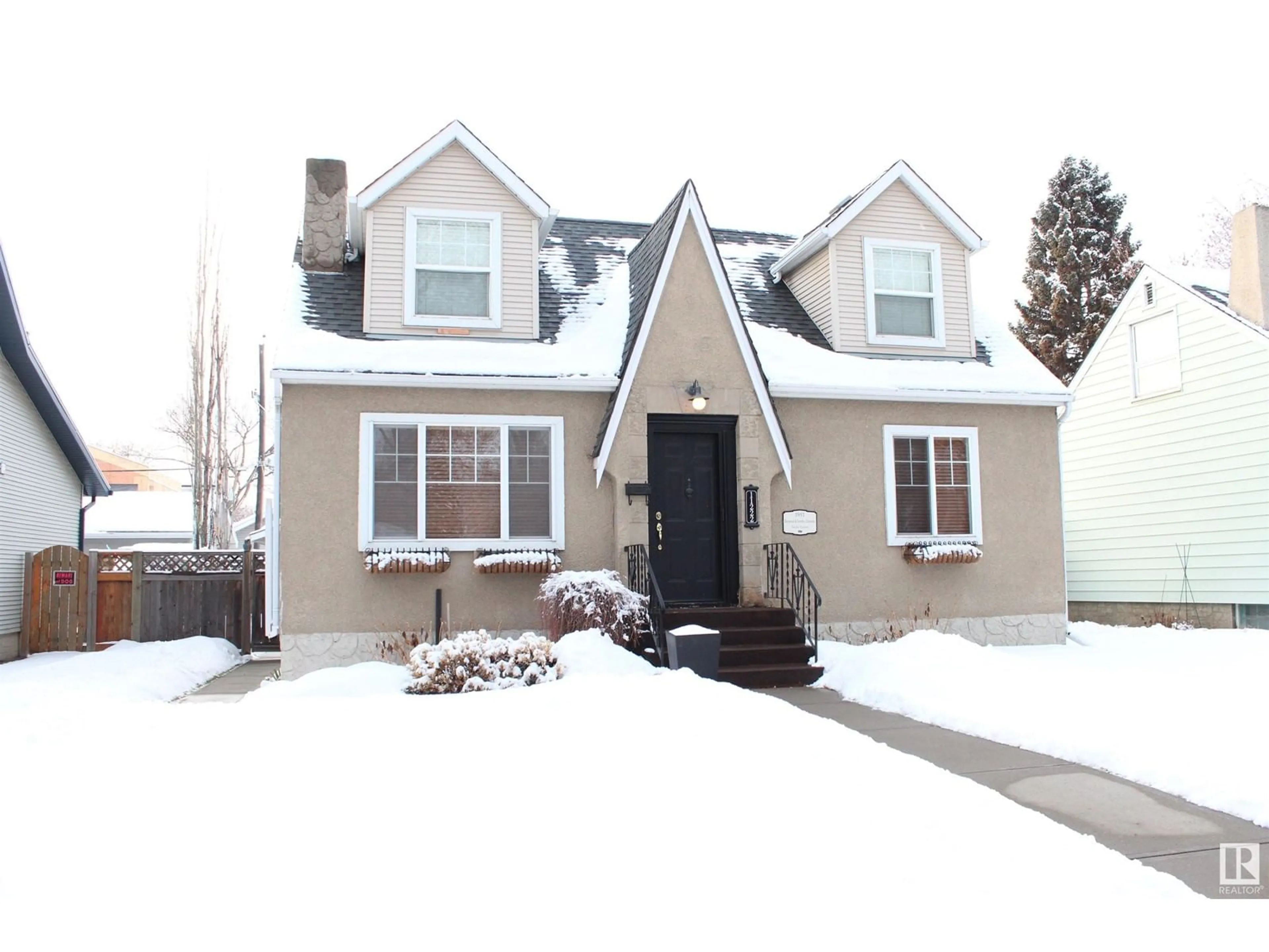 Home with vinyl exterior material, street for 11222 57 ST NW, Edmonton Alberta T5W3T9