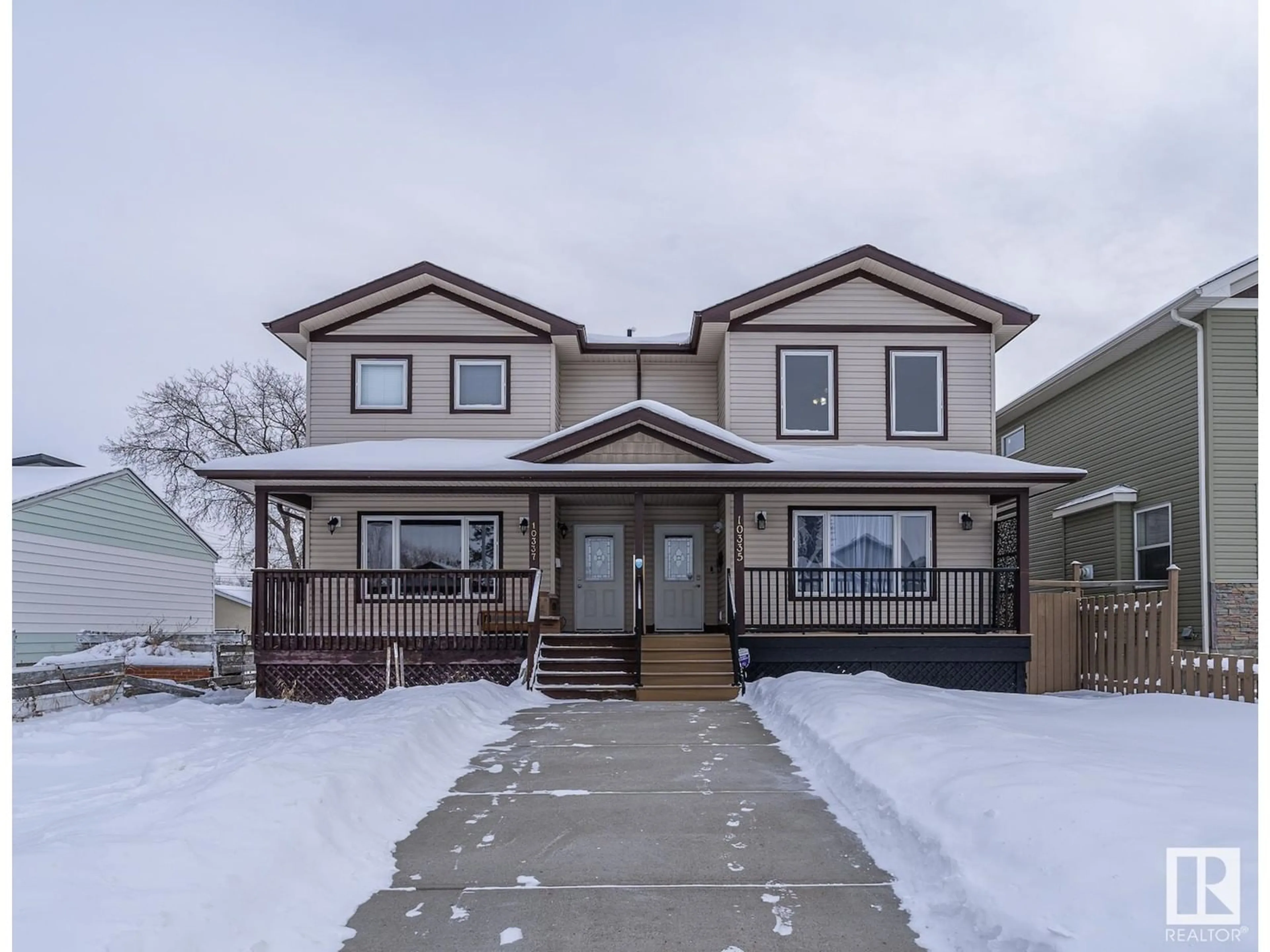 Home with vinyl exterior material, street for 10335 160 ST NW, Edmonton Alberta T5P3G2